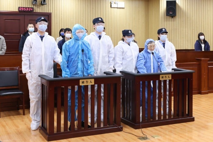 Defendants Zhang Mingjie (right, in blue) and Wang Shaoyu attend their sentencing in the Harbin City Intermediate People's Court on Wednesday. Photo: Harbin City Intermediate People's Court