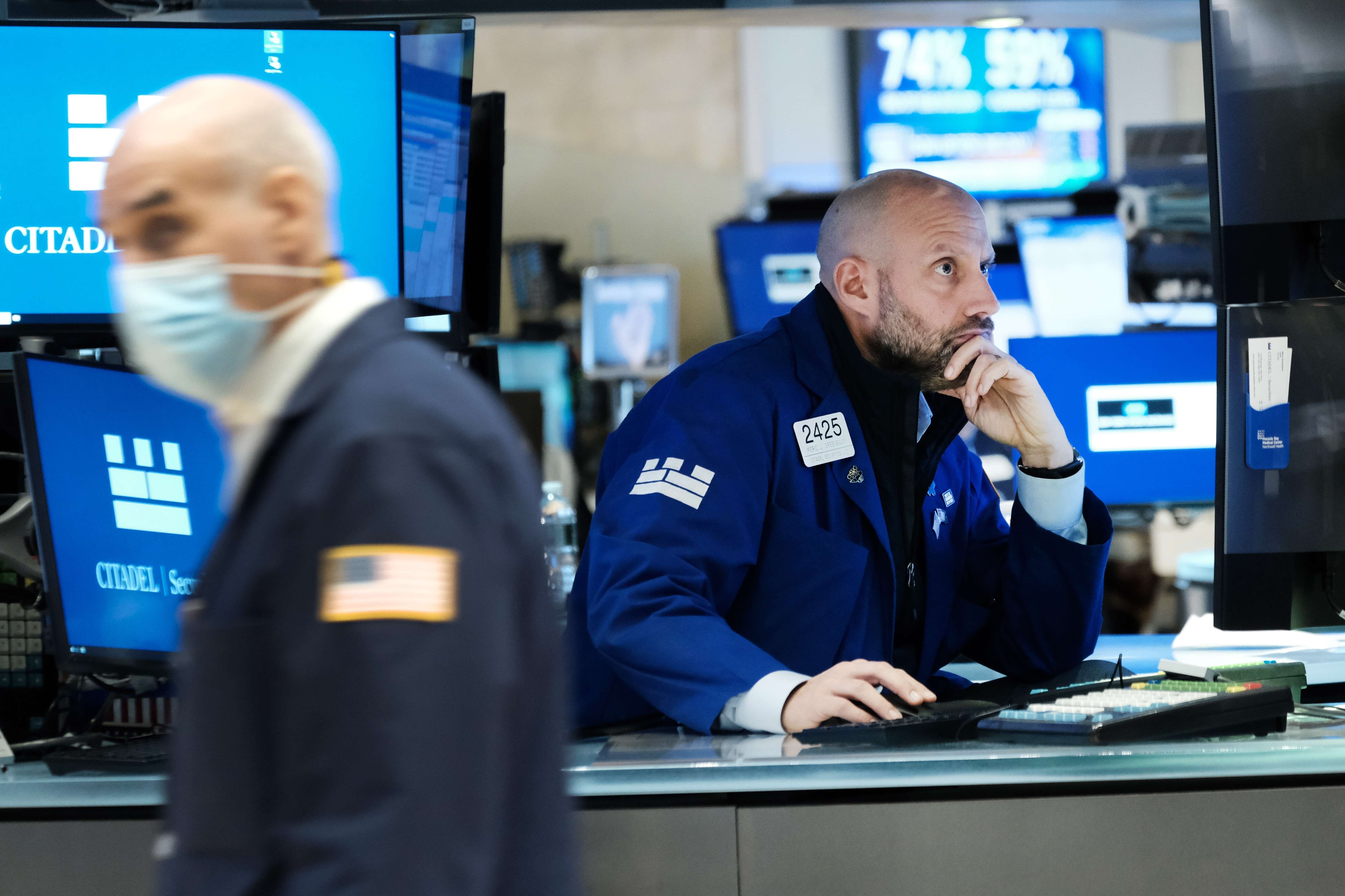 Traders work on the floor of the New York Stock Exchange on Monday. Photo: Getty Images via AFP