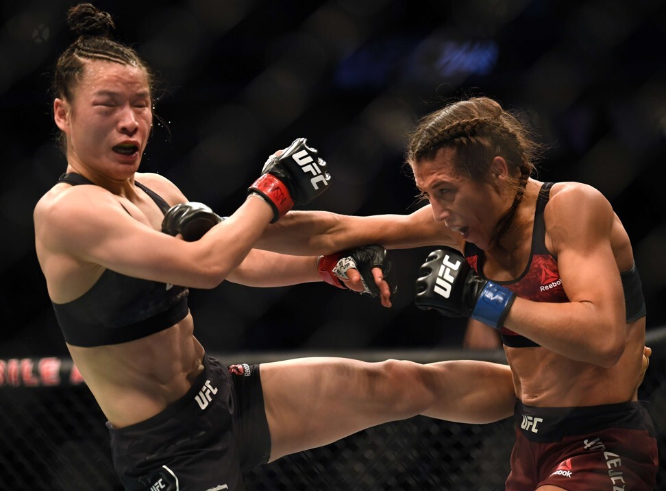 Zhang Weili (left) takes a punch form Joanna Jedrzejczyk during their bout in March, 2020 in Las Vegas. Photo: AFP