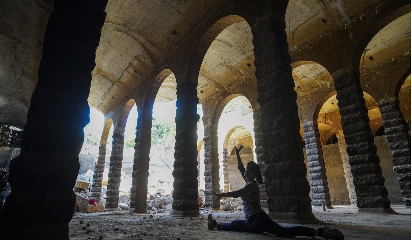 Concrete arches and brick columns are a feature of the underground reservoir. Photo: Winson Wong