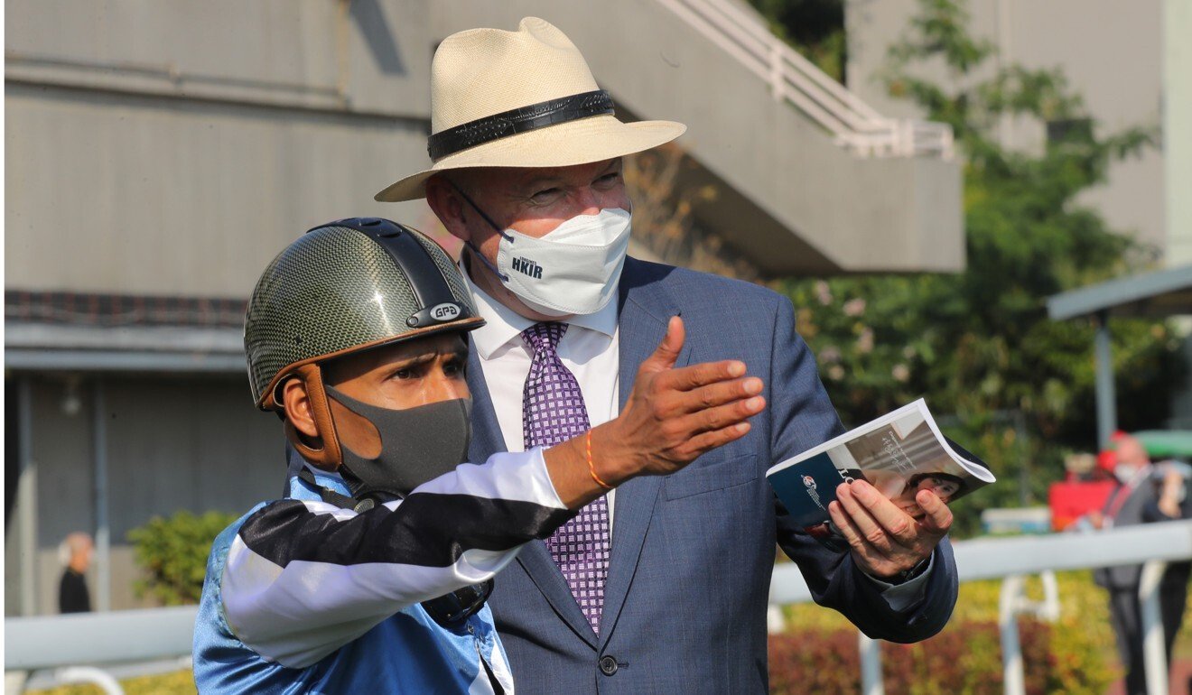 Karis Teetan talks to David Hayes after falling from Naboo Attack in the Hong Kong Sprint.