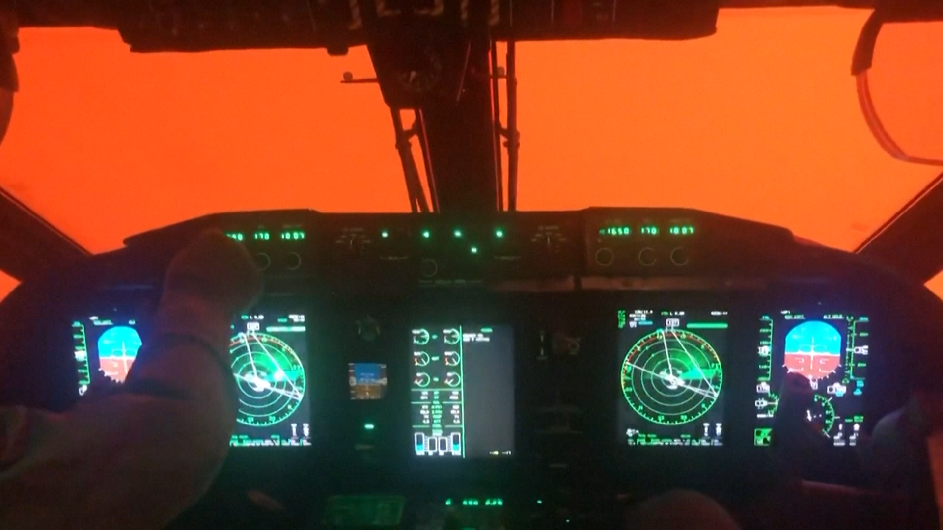Pilot Cockpit View Shrouded In Orange Glow From Australia S Bush