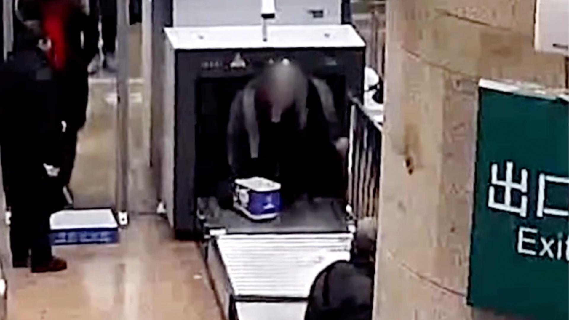 Man in China climbs into baggage scanner to avoid taking off his bag