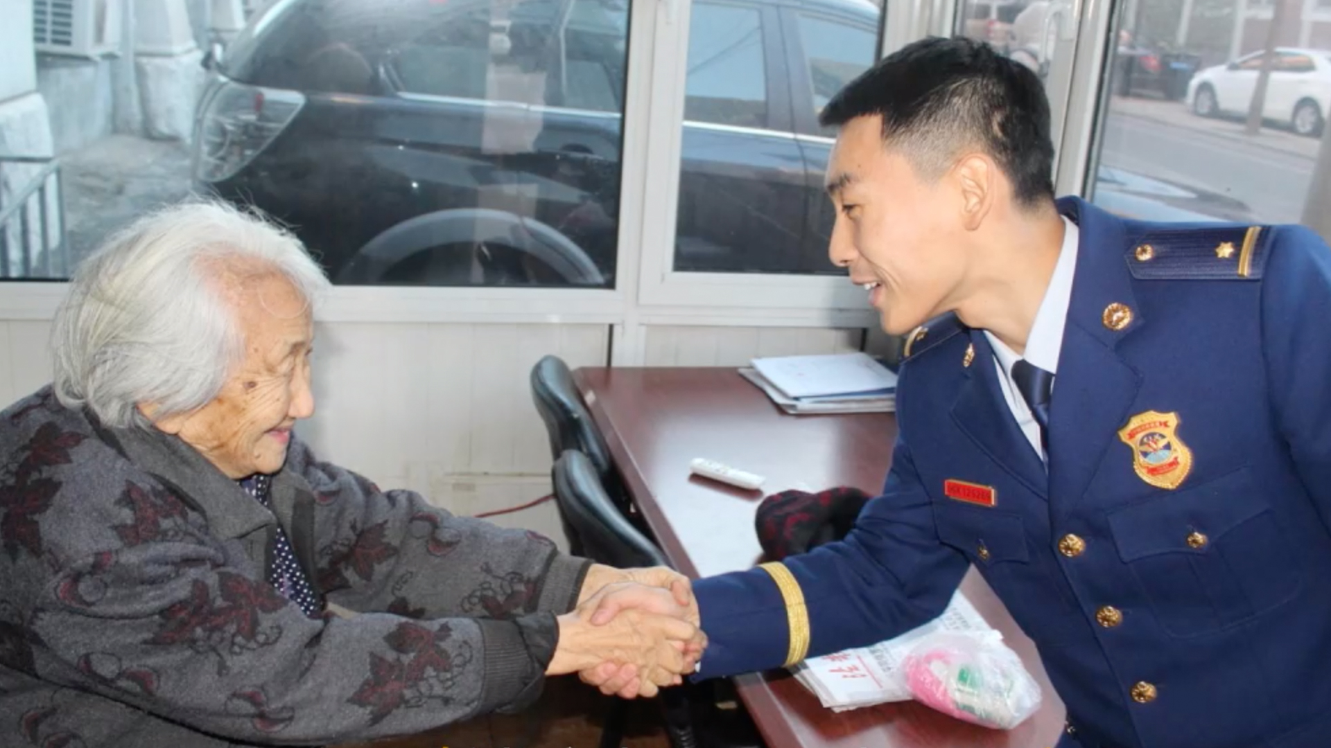 Chinese fire station official becomes elderly woman’s ‘grandson’