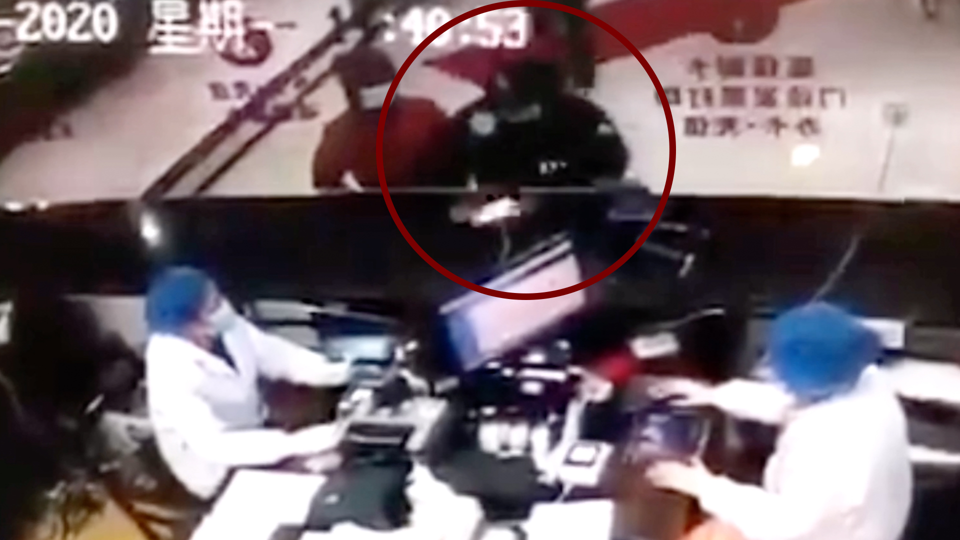 Man with fever in China coughs at medical workers after failing to get medicine