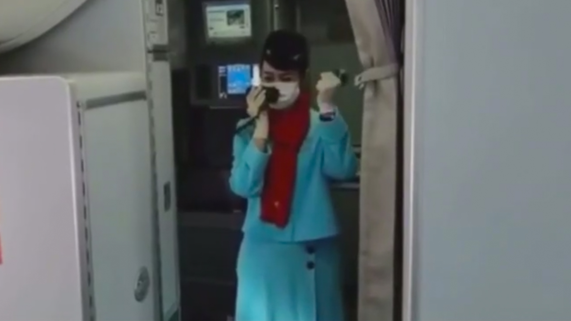 Coronavirus: Tearful stewardess thanks medical workers on board for supporting her hometown