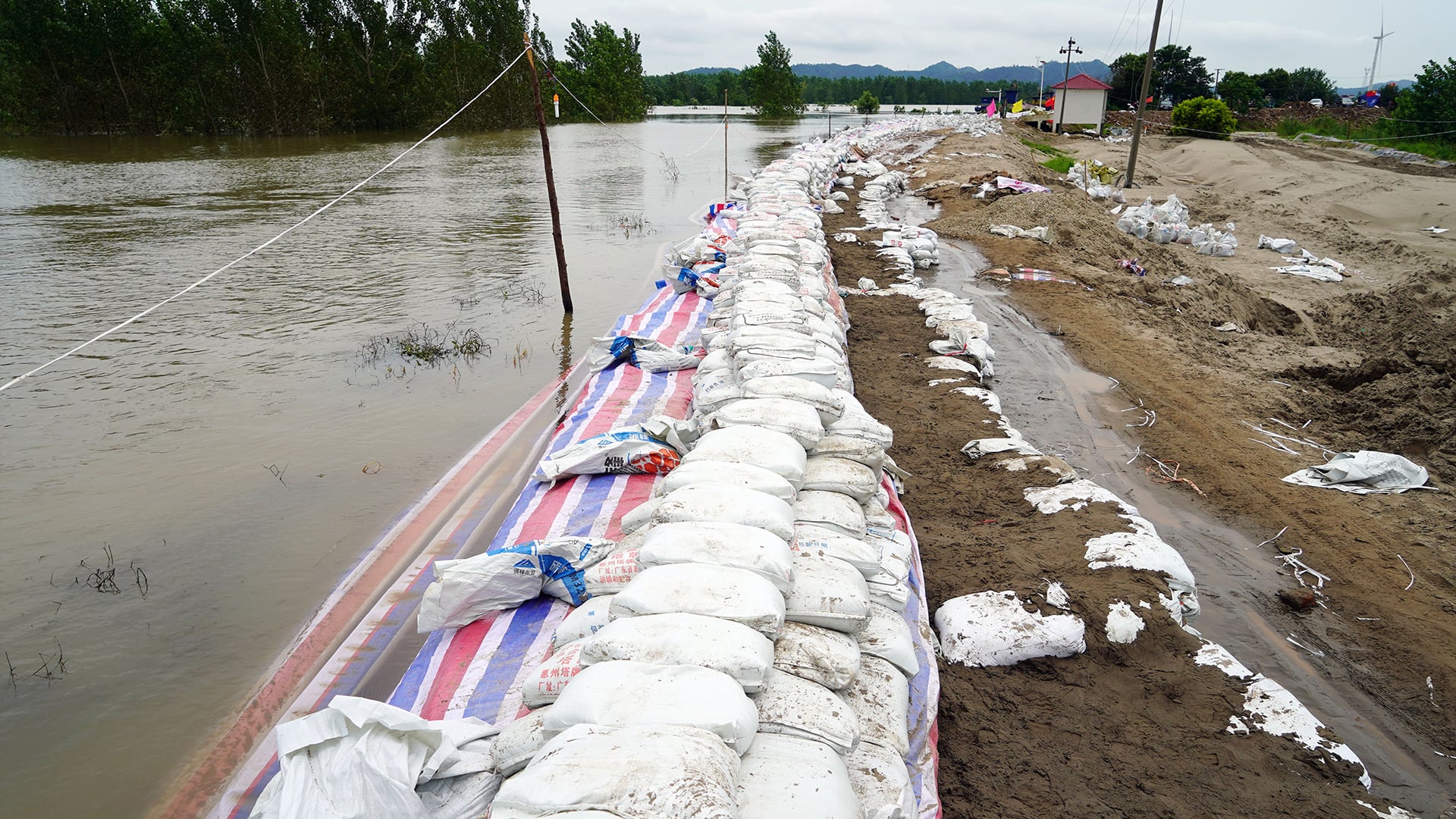 Global warming and illegal land reclamation add to severe floods ...