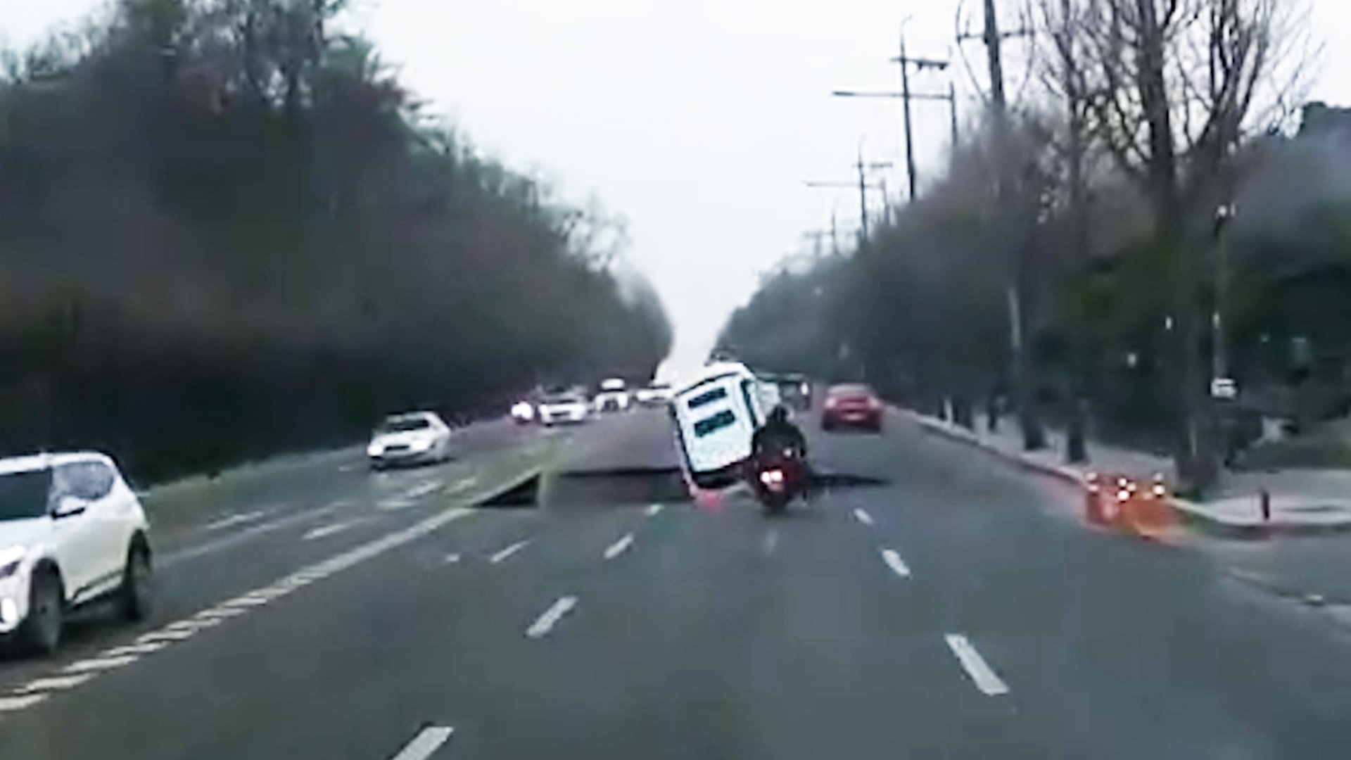 Twenty-metre-deep sinkhole in South Korea kills motorcyclist