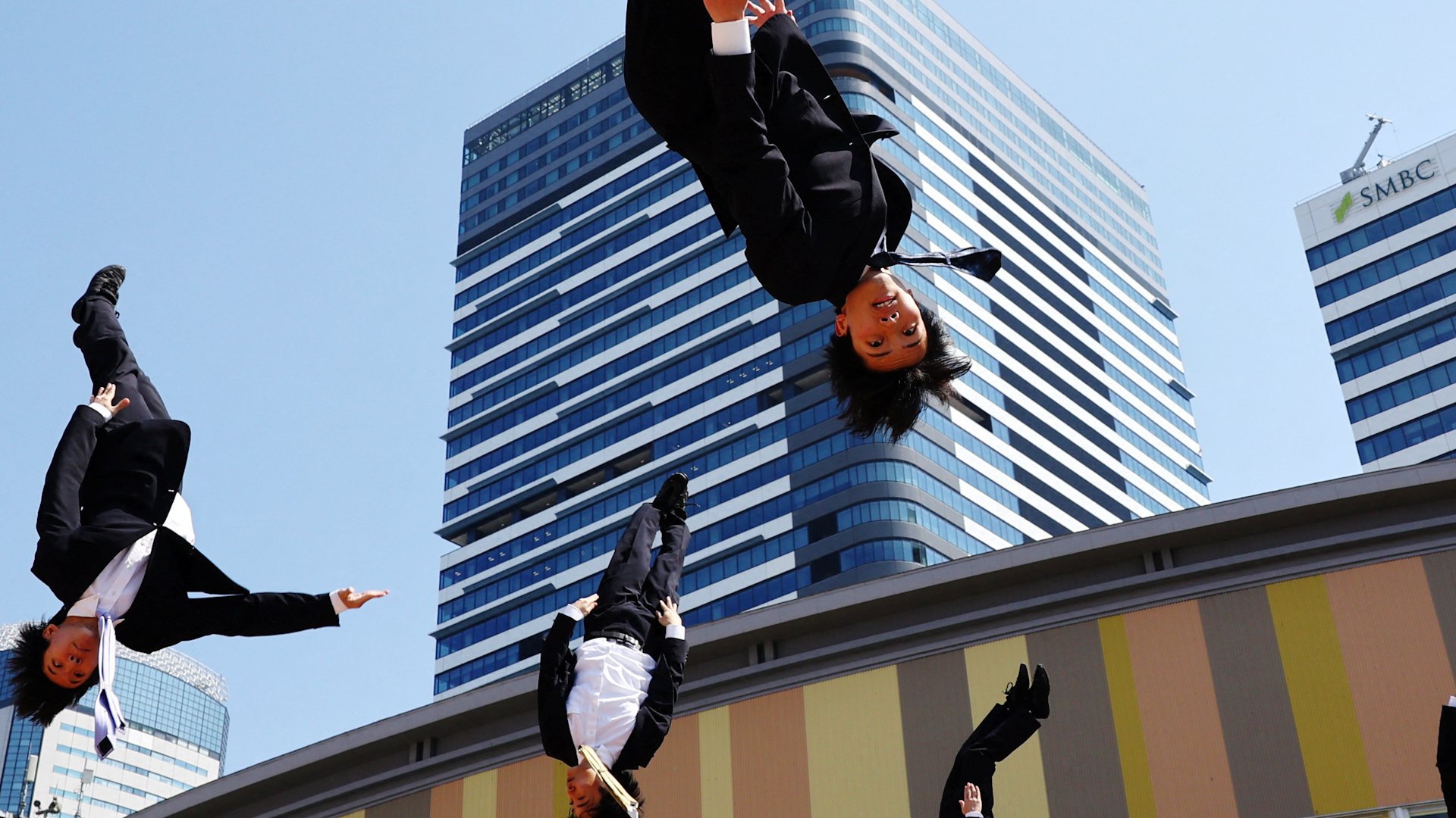 Japanese salarymen find joy in cheerleading