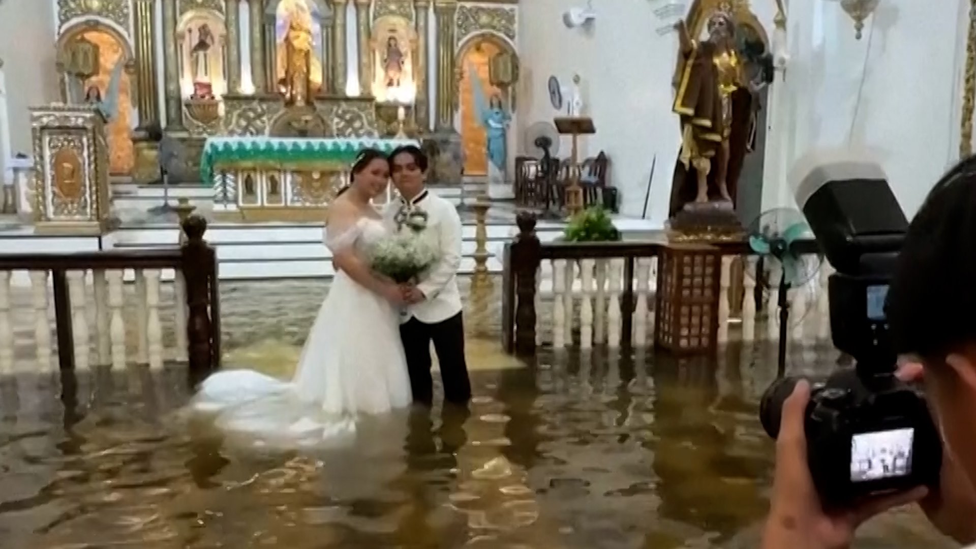 Filipino couple marry in ‘extraordinary wedding’ during Typhoon Wipha