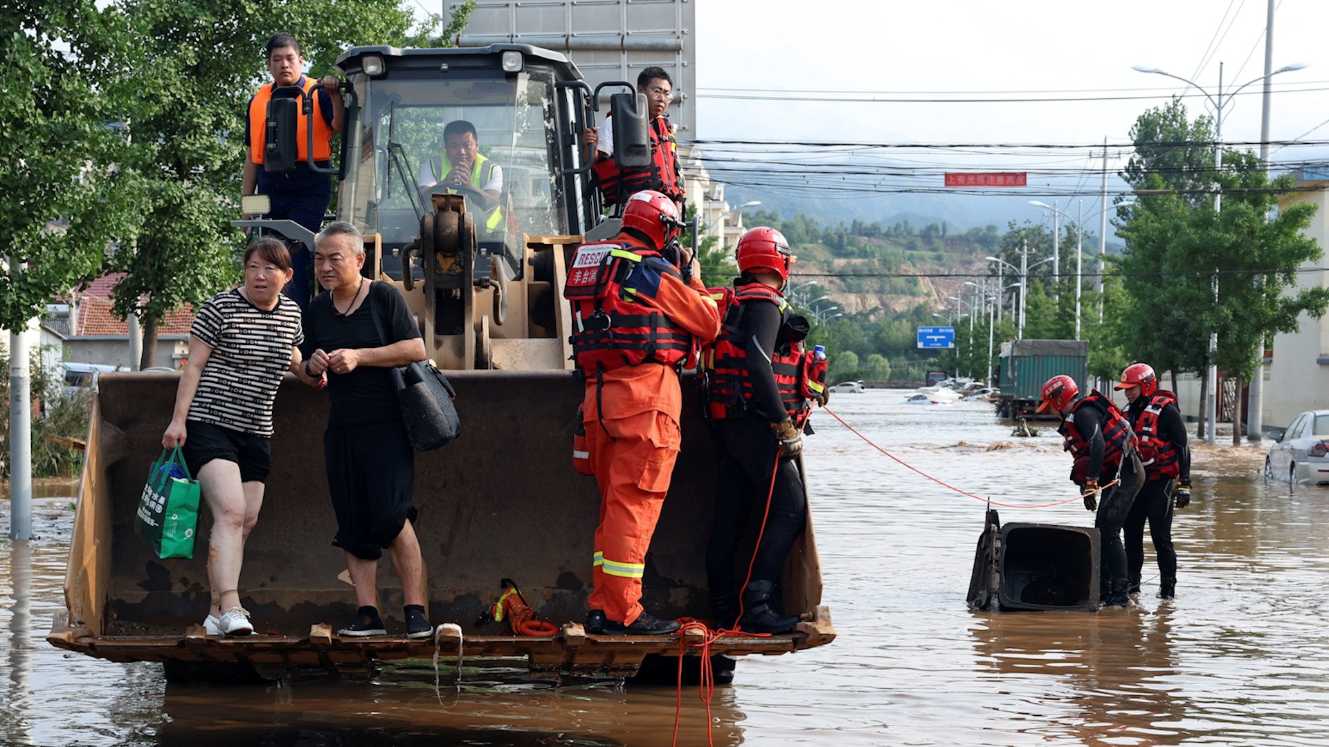 ‘A big storm unseen in a century’: heavy rainfall in Beijing kills at least 30