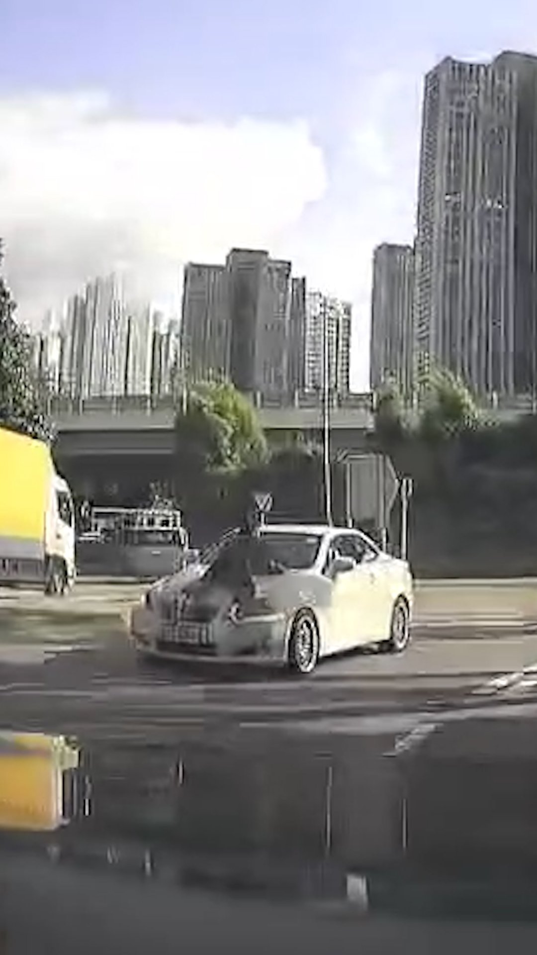 Man clings to bonnet of speeding car after argument with girlfriend