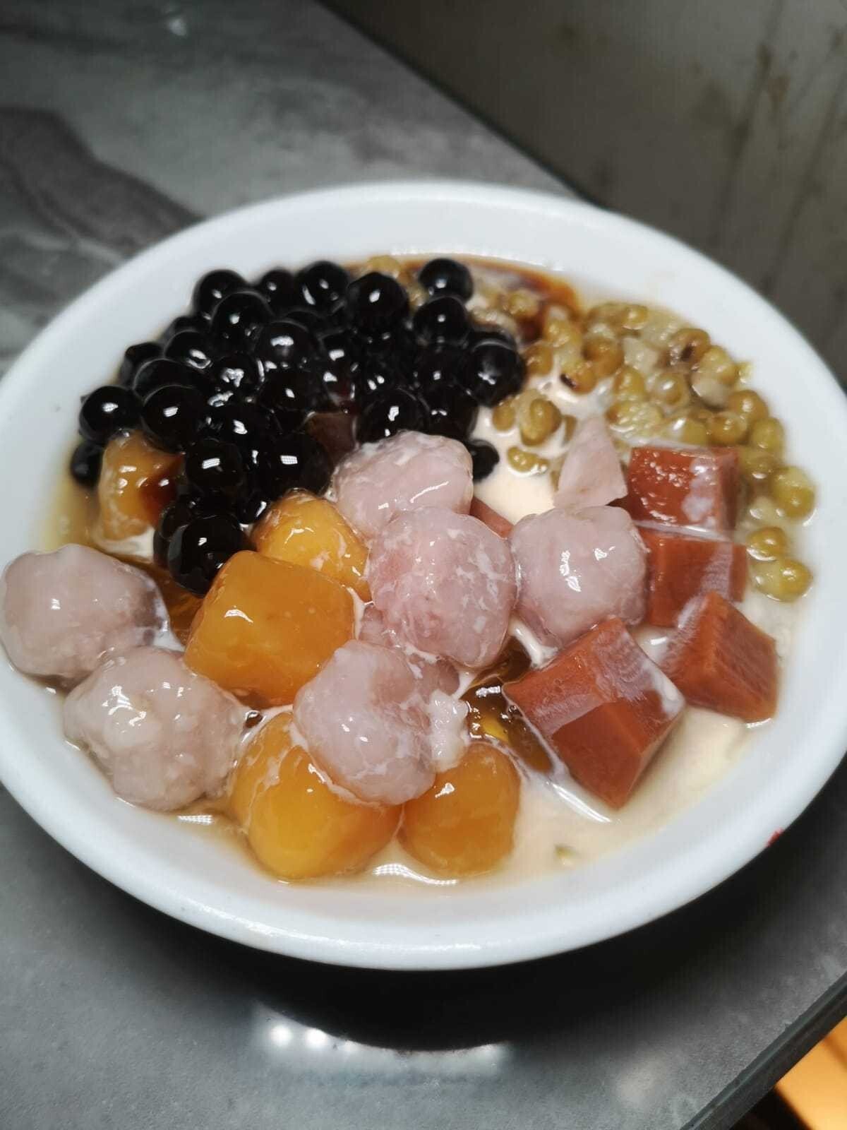 Taro balls dessert, lots going on and it might not be to your liking. 