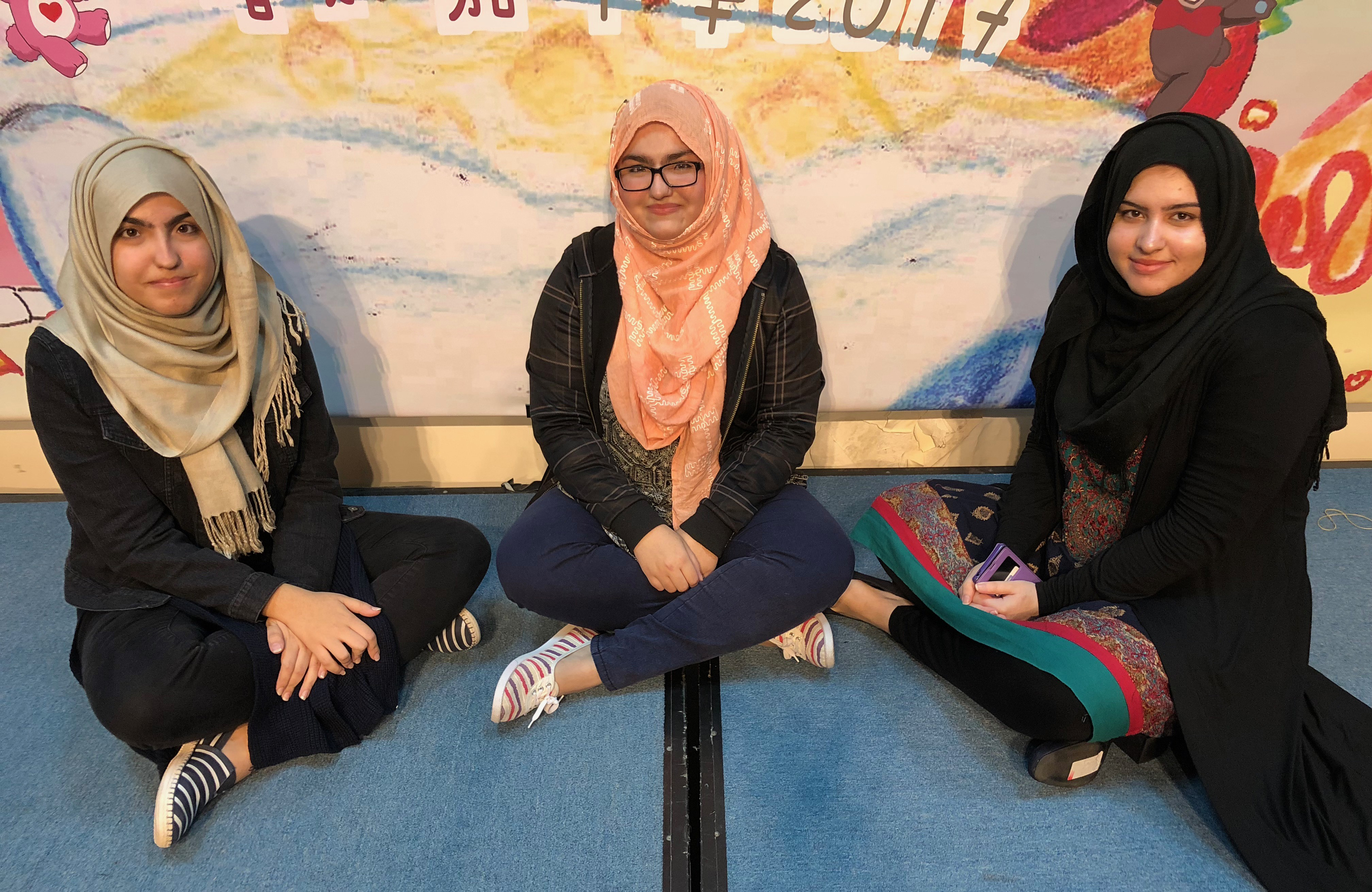 Sisters (from left) Ekra, Uzma, and Huma and say their love of education and learning comes from their mum.