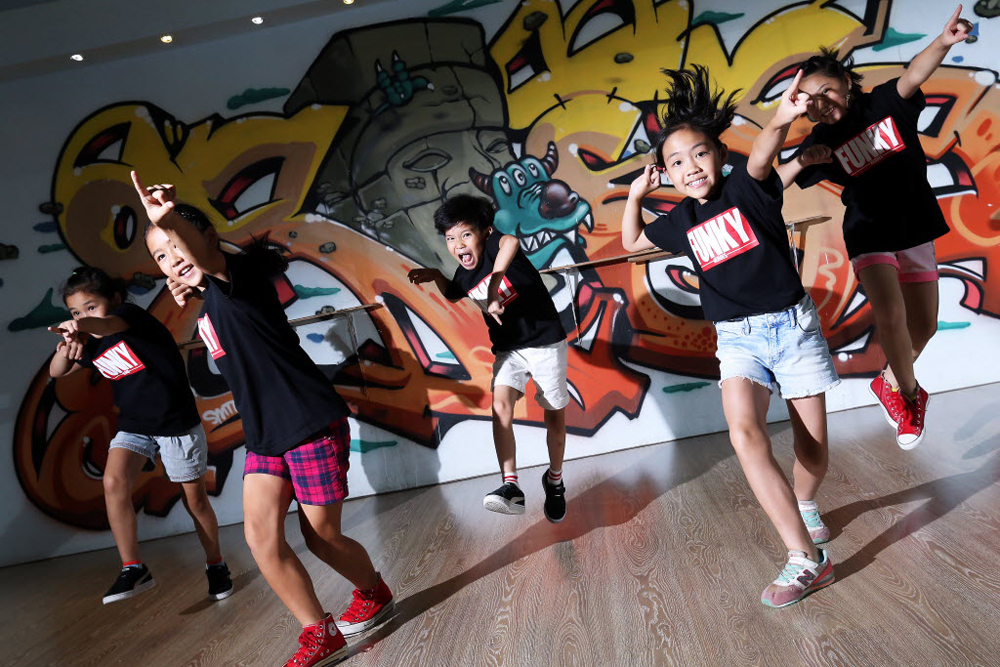 (L-R) Satsuki Ma, Mizuki Ma, Leander Lau, Hailey Wong and Hobie Hui of Funky Heroes love  the freedom offered by street dancing. 