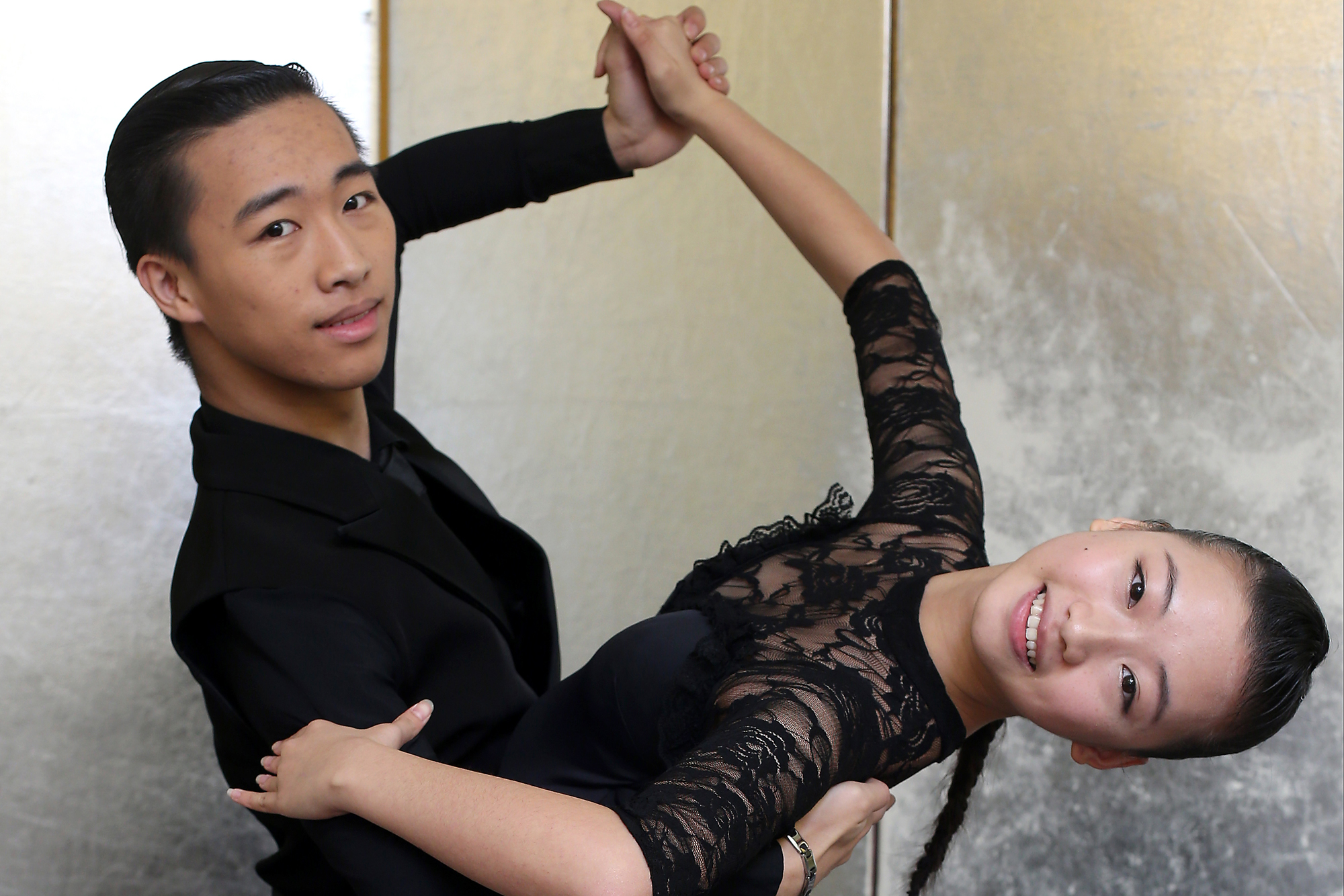 Brother and sister make sacrifices to balance school and competing in DanceSport