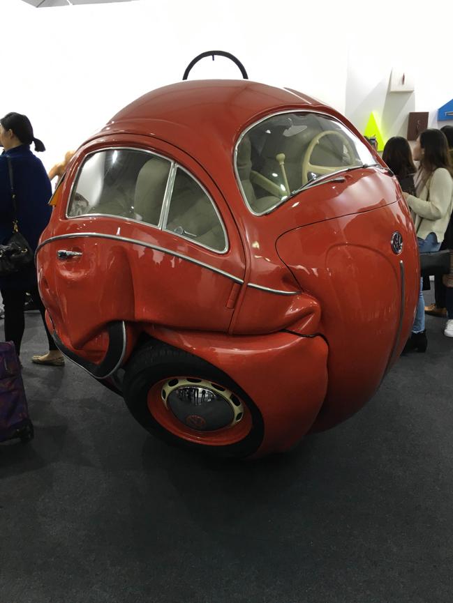 The Beetle Sphere, a huge work made of a crushed car, by Ichwan Noor