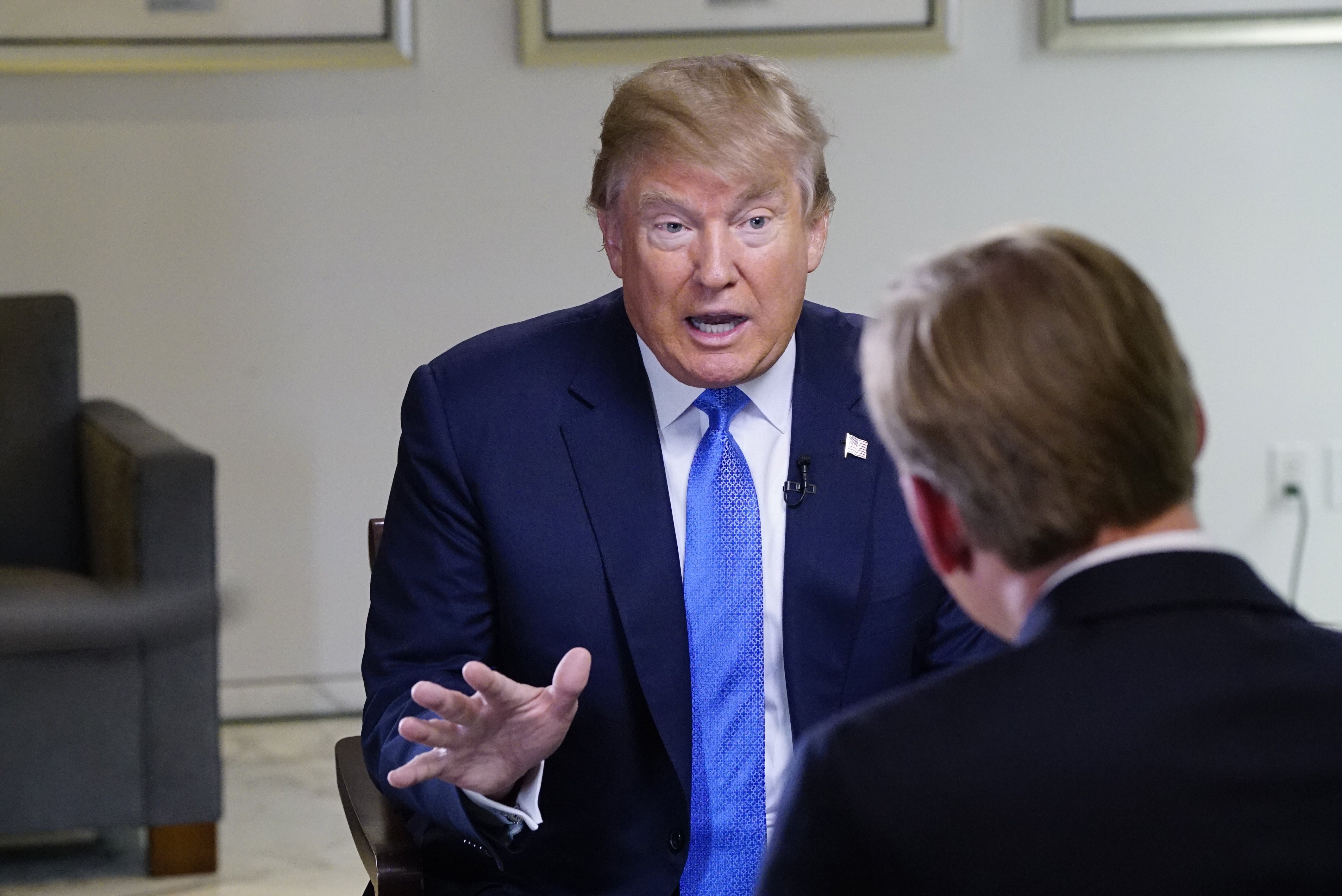 In this Friday, Oct. 9, 2015, photo, provided by CBS, Republican presidential candidate Donald Trump speaks during an interview with John Dickerson at Trump Tower in New York, for the Sunday, Oct. 11, edition, of "Face The Nation." (John P. Filo/CBS via AP)