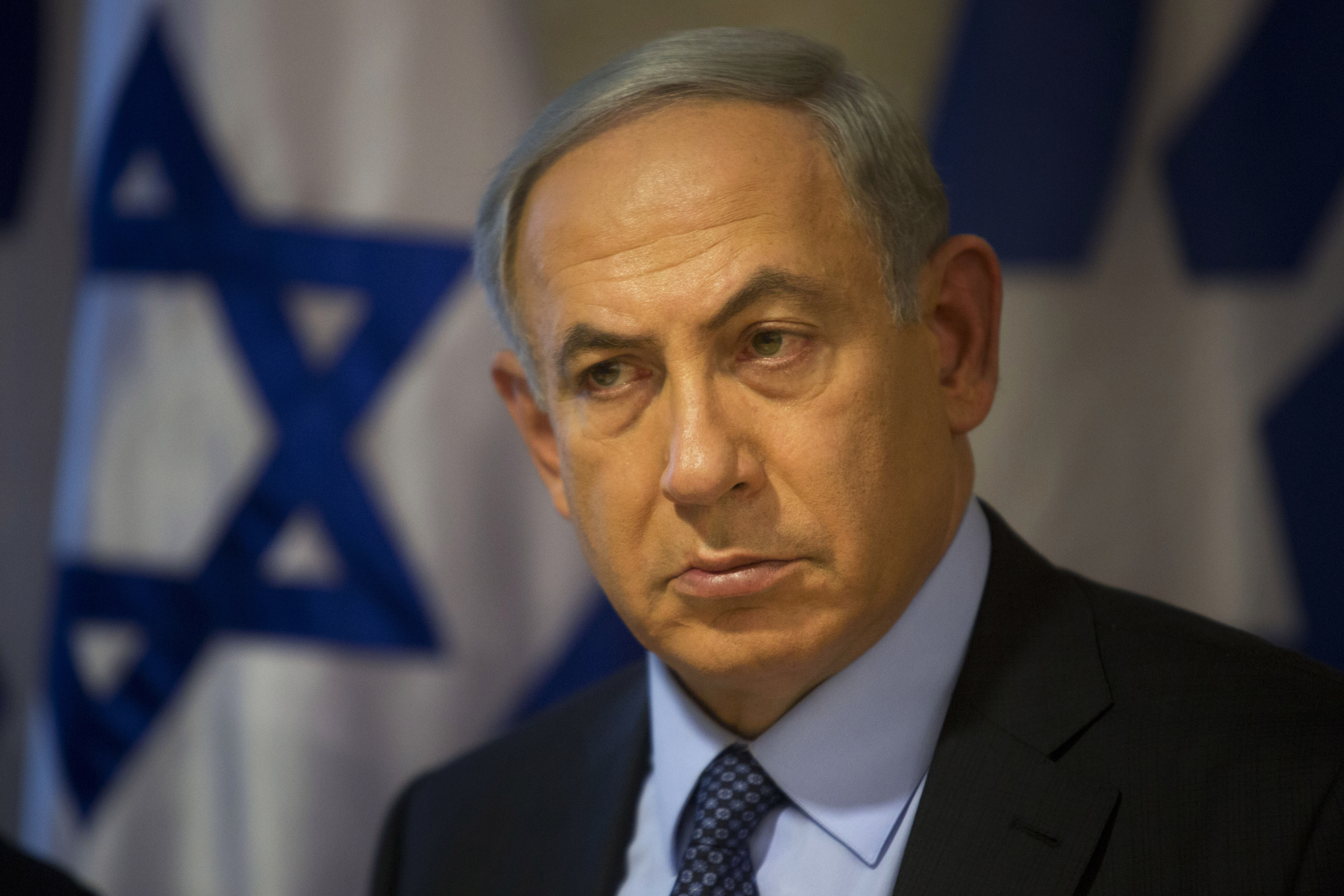 Israeli Prime Minister Benjamin Netanyahu looks on during a press conference at the Foreign Ministry in Jerusalem, Thursday, Oct. 15, 2015. Netanyahu on Thursday said he would be "perfectly open" to meeting with Palestinian President Mahmoud Abbas in order to end weeks of Israeli-Palestinian unrest. (AP Photo/Sebastian Scheiner)