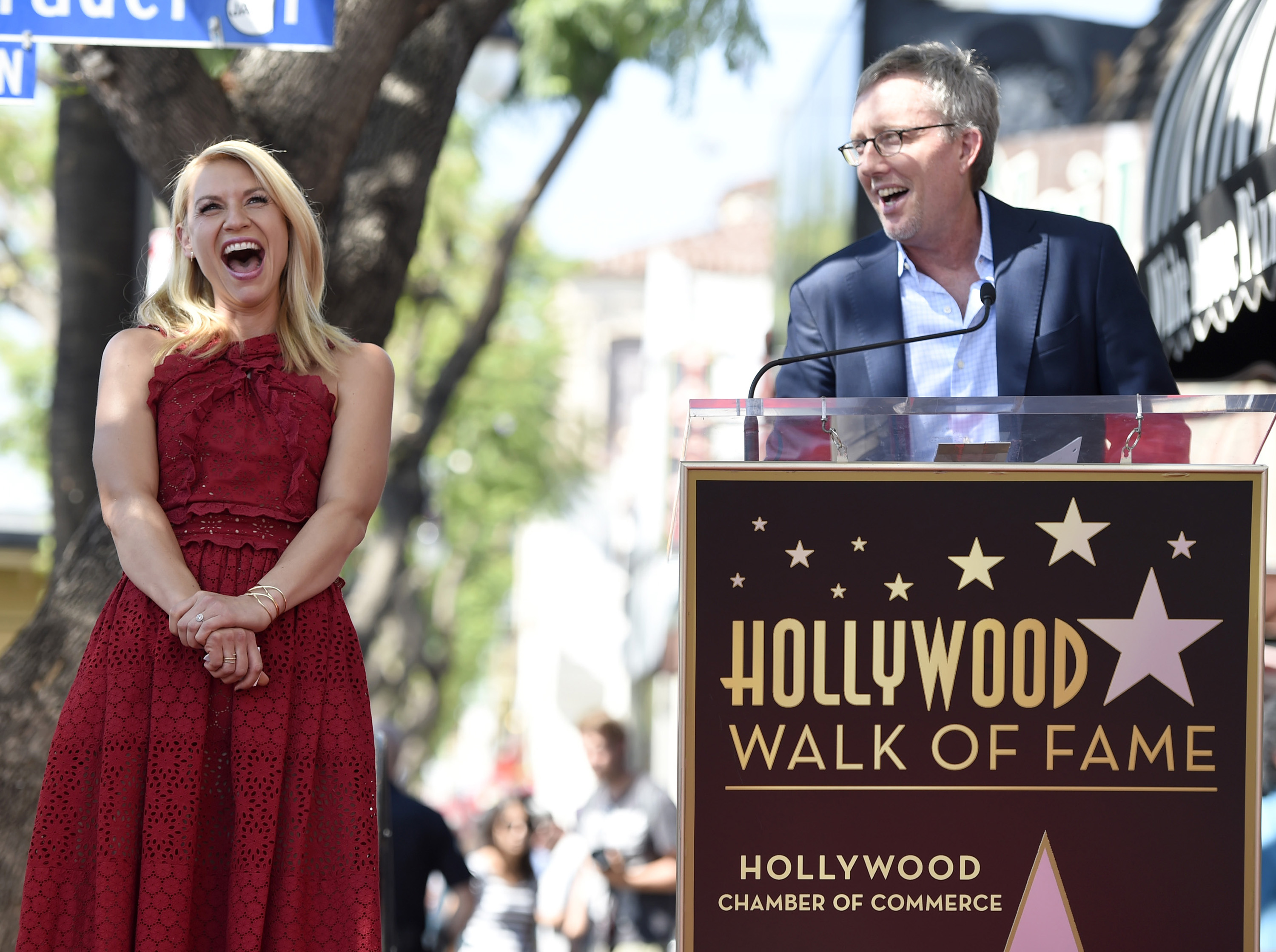 Claire Danes, left, reacts as Alex Gansa speaks at a ceremony where Danes is awarded a star on the Hollywood Walk of Fame on Thursday, Sept. 24, 2015, in Los Angeles. (Photo by Chris Pizzello/Invision/AP)