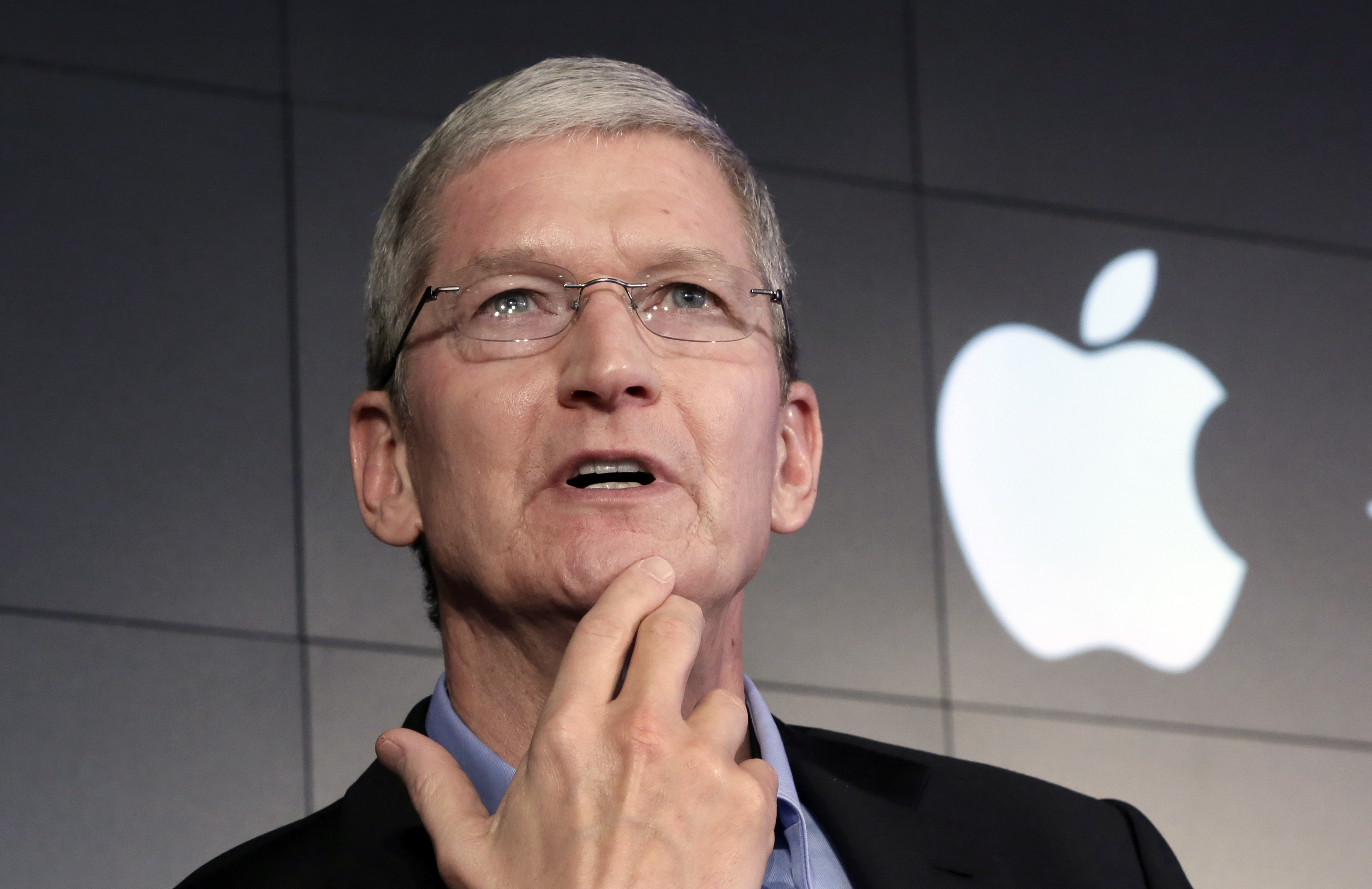 FILE - In this April 30, 2015 file photo, Apple CEO Tim Cook responds to a question during a news conference at IBM Watson headquarters, in New York. Cook is getting an award from the Human Rights Campaign, an advocacy group for gay, lesbian, bisexual and transgender rights. The award is to be presented to Cook on Saturday, Oct. 3, 2015. (AP Photo/Richard Drew, File)