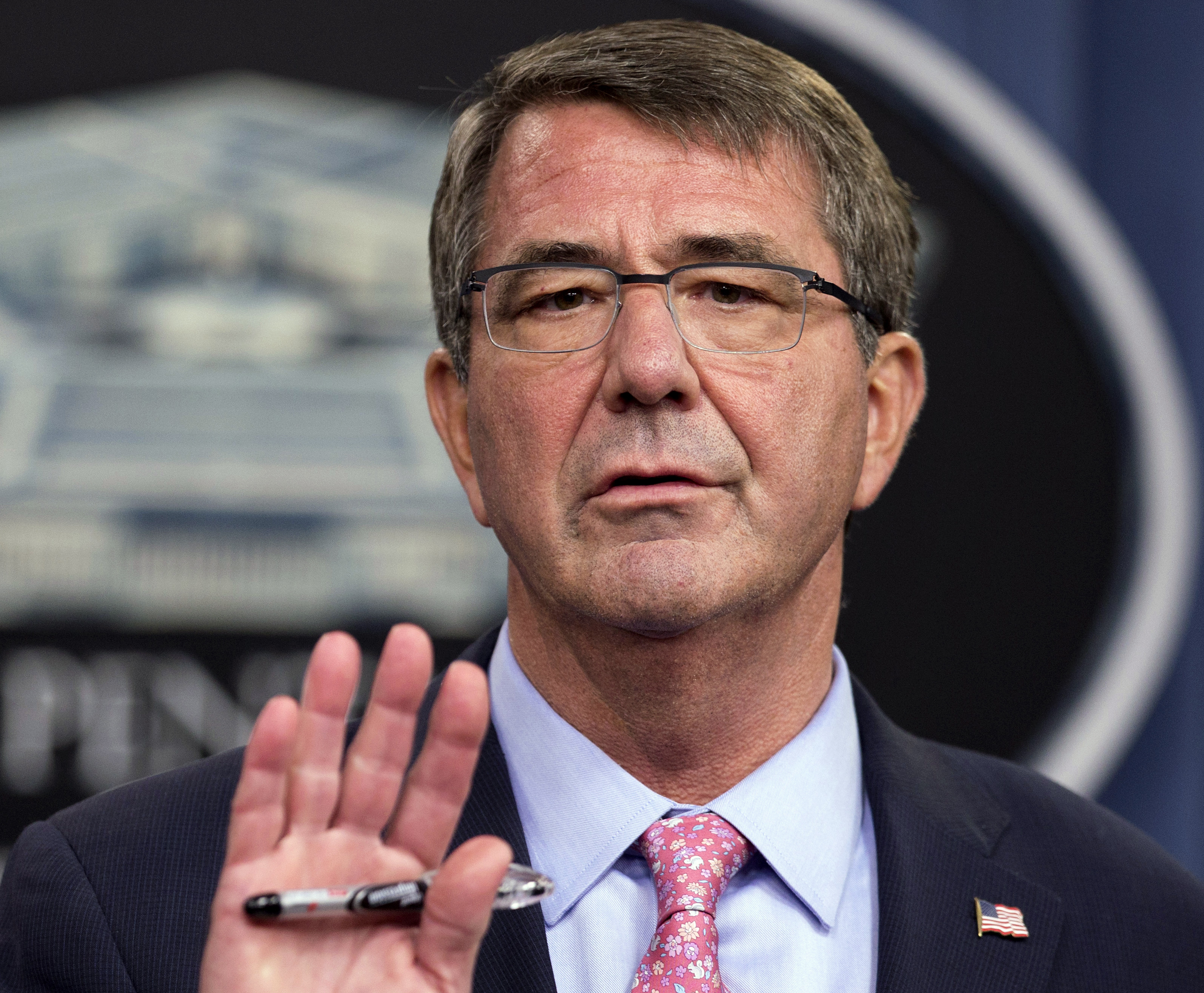 FILE - In this Sept. 30, 2015, file photo Defense Secretary Ash Carter speaks to reporters during a news conference at the Pentagon. Carter says the American soldier killed in the mission that rescued 70 hostages from an Islamic State prison in Iraq was a hero for rushing into a firefight to defend his Kurdish partners, even though the plan called for the Kurds to do the fighting on their own. On Oct. 23, Carter applauded 39-year-old Army Master Sgt. Joshua L. Wheeler of Roland, Oklahoma, who died of his wounds Oct. 22. (AP Photo/Manuel Balce Ceneta, File)