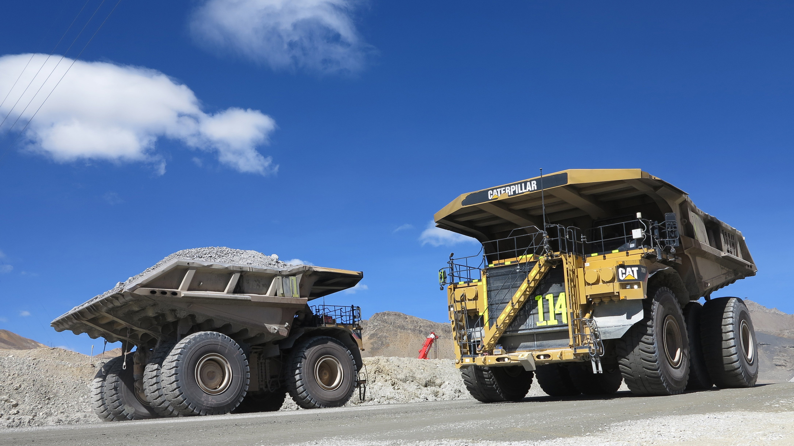 Huge dump trucks carry ore on July 15, 2015 at the Toromocho Mine in the central Peruvian Andes. The open-pit copper mine, owned and operated by the Aluminum Corporation of China, is one of a growing number of Chinese investments across Latin America. (Tim Johnson/McClatchy/TNS)