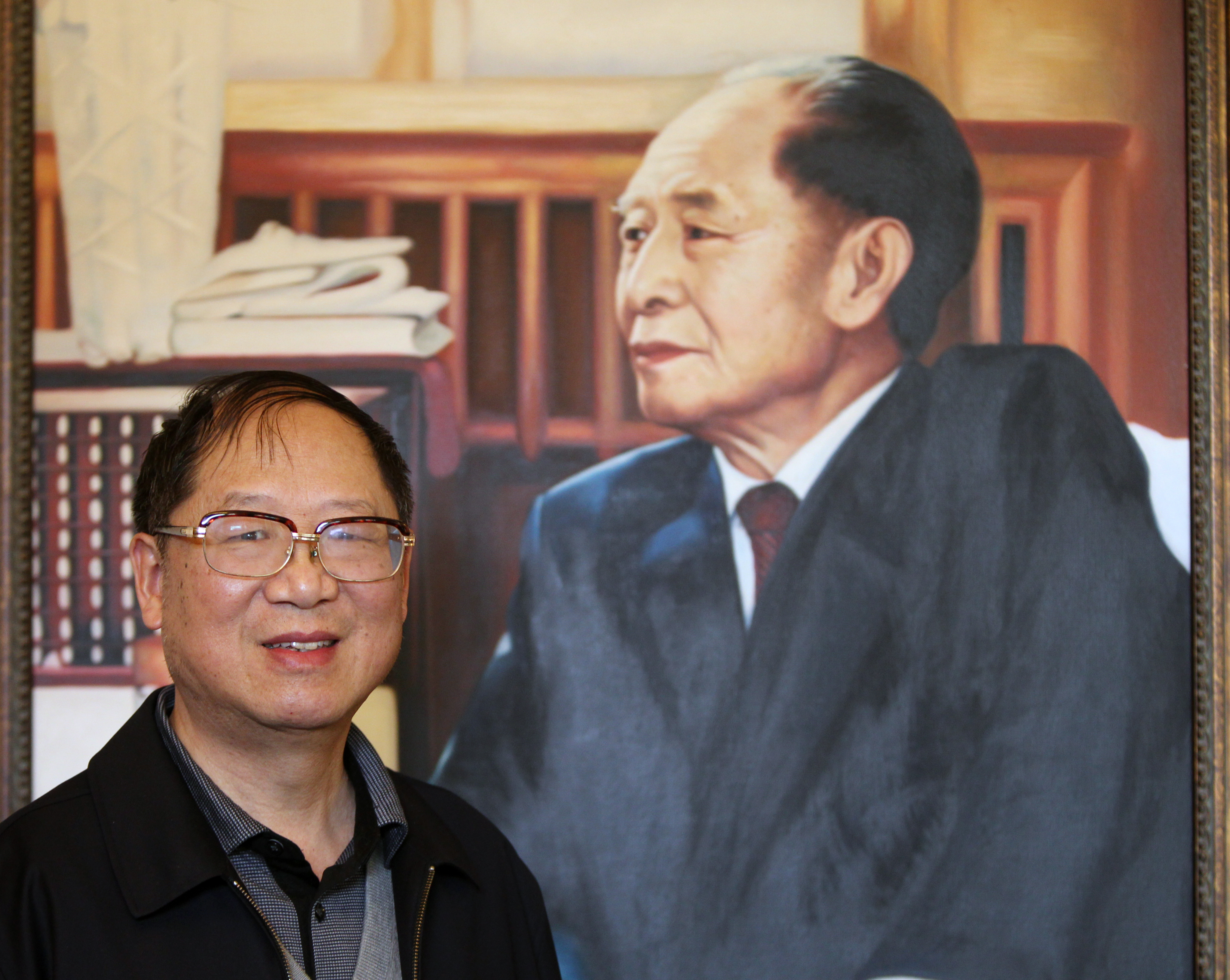 Hu Dehua, youngest son of former general secretary of Communist Party of China Hu Yaobang, poses for a photograph during an interview at home in Beijing. 07APR14 == Photo by Simon Song ==