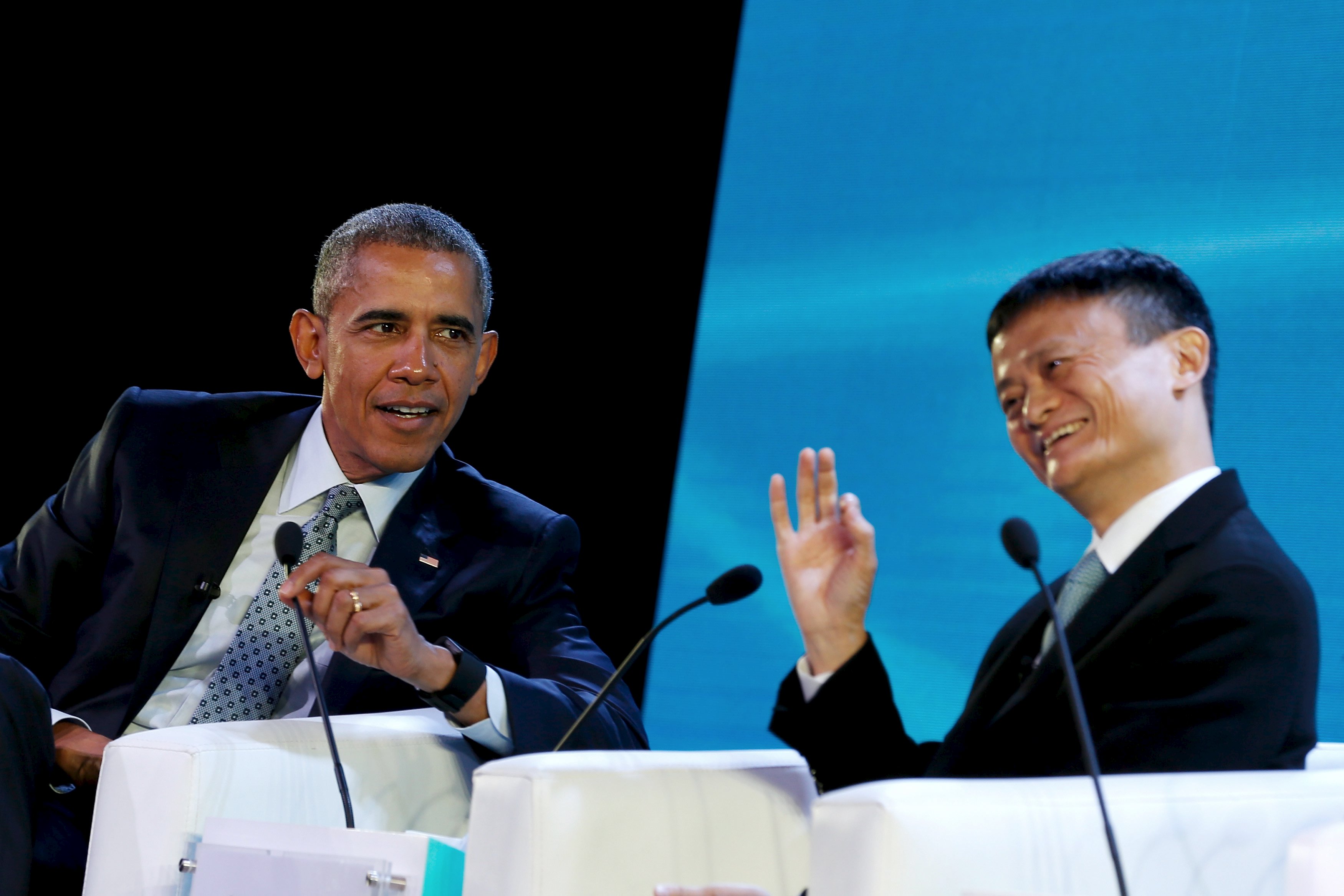 U.S. President Barack Obama (L) and Alibaba CEO Jack Ma participate in a panel discussion at the APEC CEO Summit in Manila, Philippines, November 18, 2015. REUTERS/Jonathan Ernst