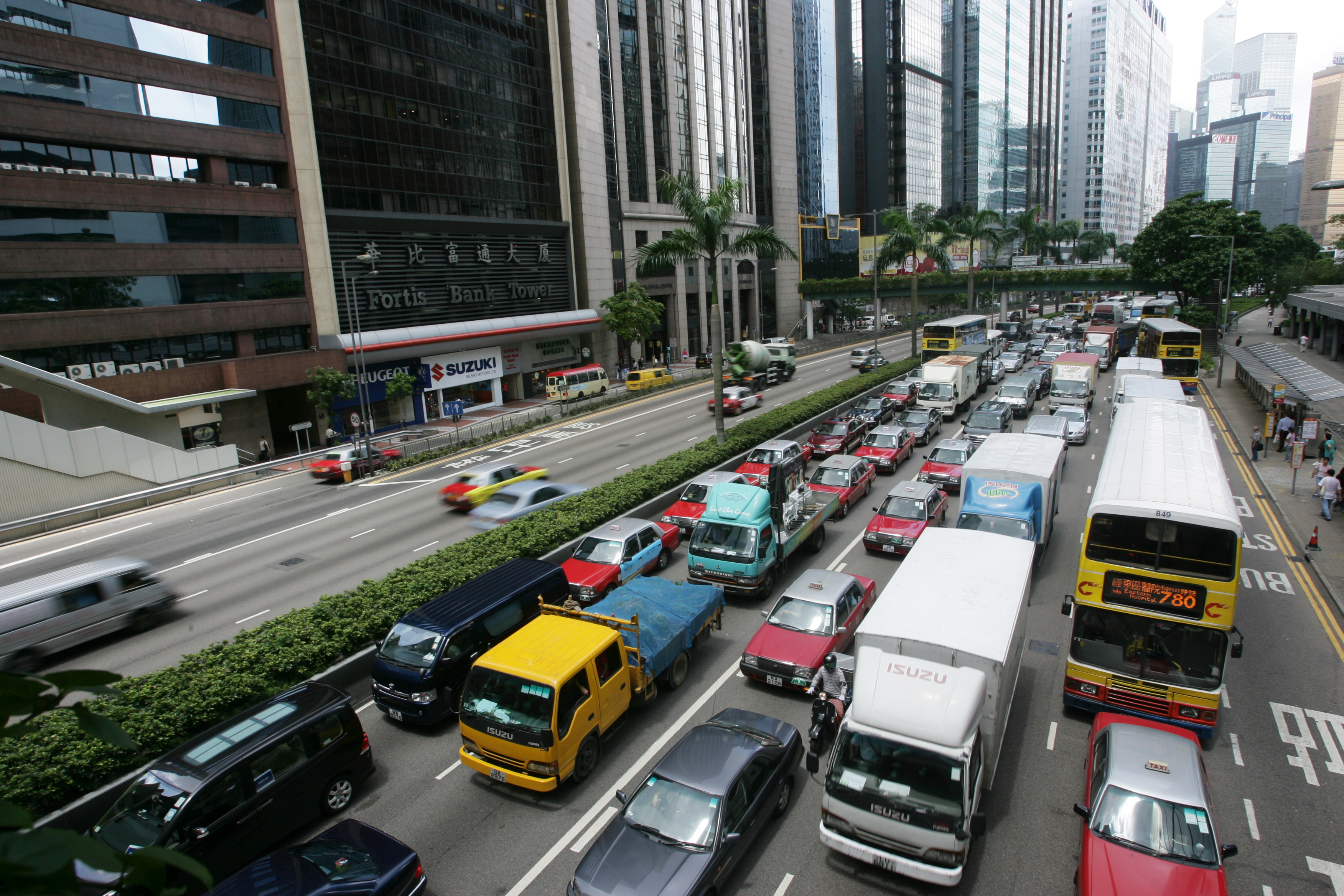 Traffic is heavily congested from Central to Hong Kong Island east after police have closed down part of the Eastern Corridor for firemen to clean up the 100-meter-long oil sludge on Eastern Corridor leaked by a medium-weight truck in the morning. Pictured outside Fortis Bank Tower in Gloucester Road, Wanchai. 18 JULY 2007
