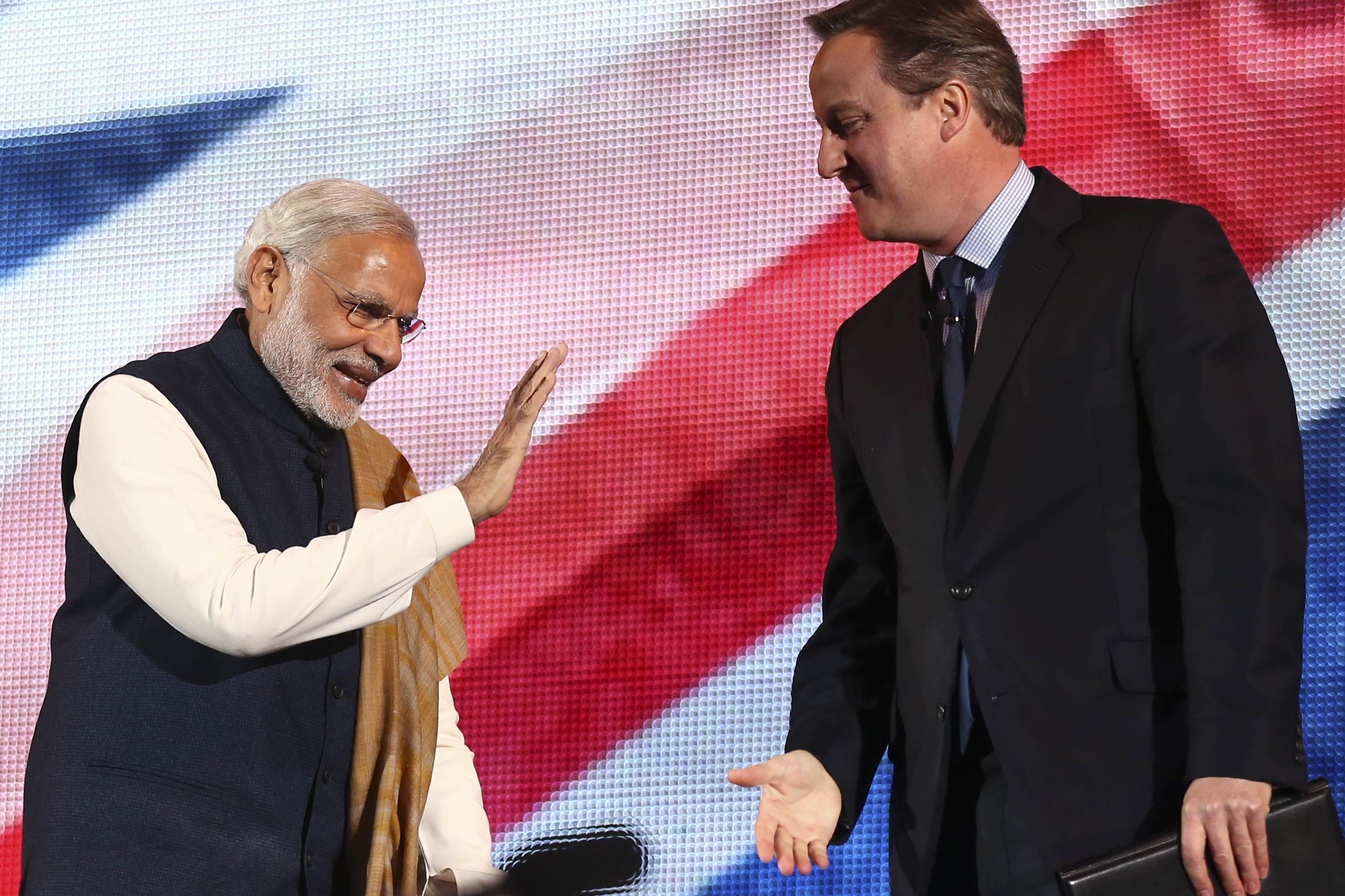 Narendra Modi (left) with British Prime Minister David Cameron in London earlier this month. Despite his international popularity, Modi faces domestic disillusionment. Photo: AFP