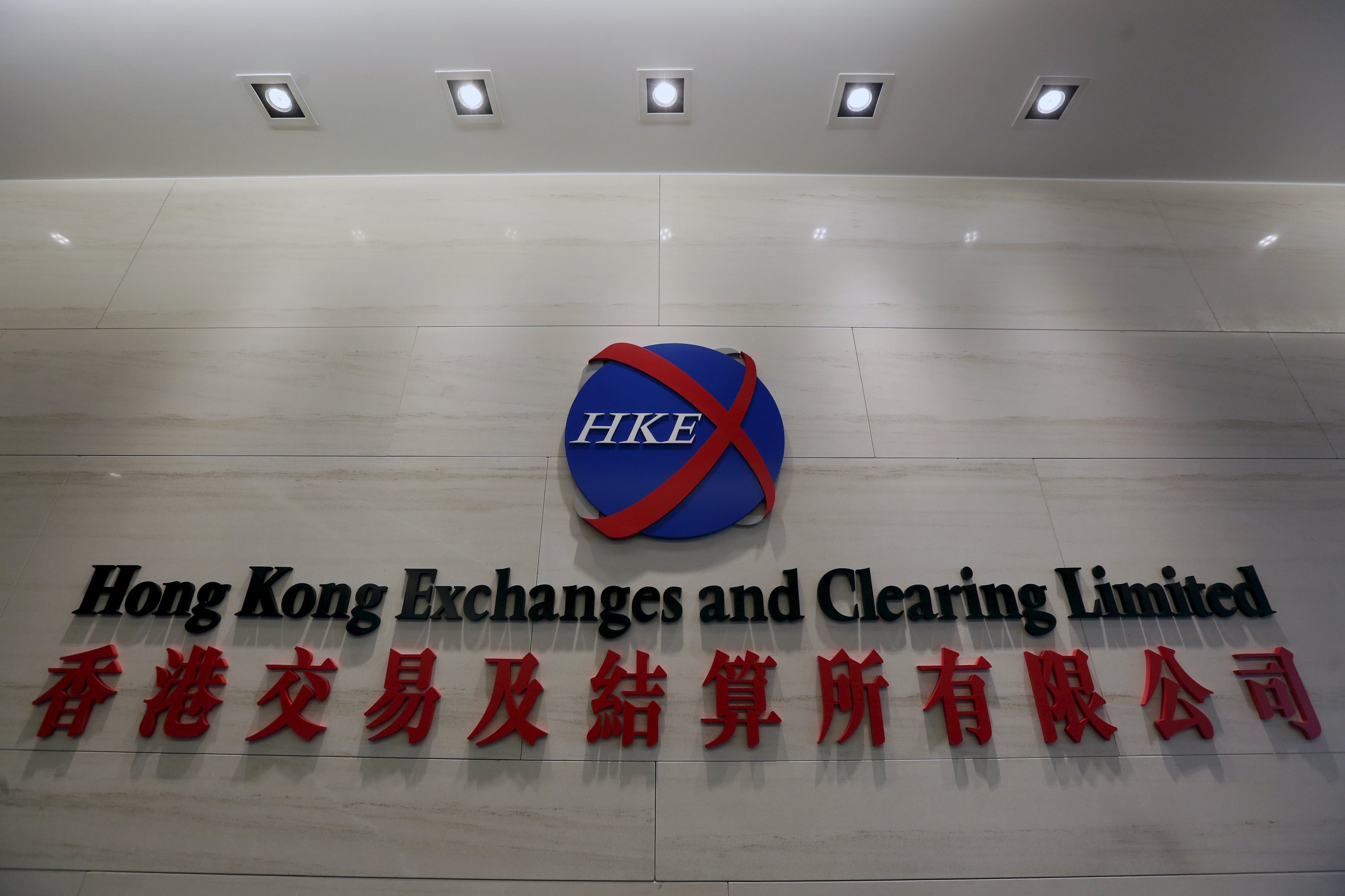 The company logo of Hong Kong Exchanges and Clearing Limited is displayed at its office in Hong Kong, China November 17, 2015. China's regulators may have overreacted with proposed new trading curbs to stamp out speculative behaviour but the Hong Kong stock exchange remains hopeful that onshore markets will eventually rise to international standards, its chief executive told Reuters on November 17. November 17, 2015. REUTERS/Bobby Yip