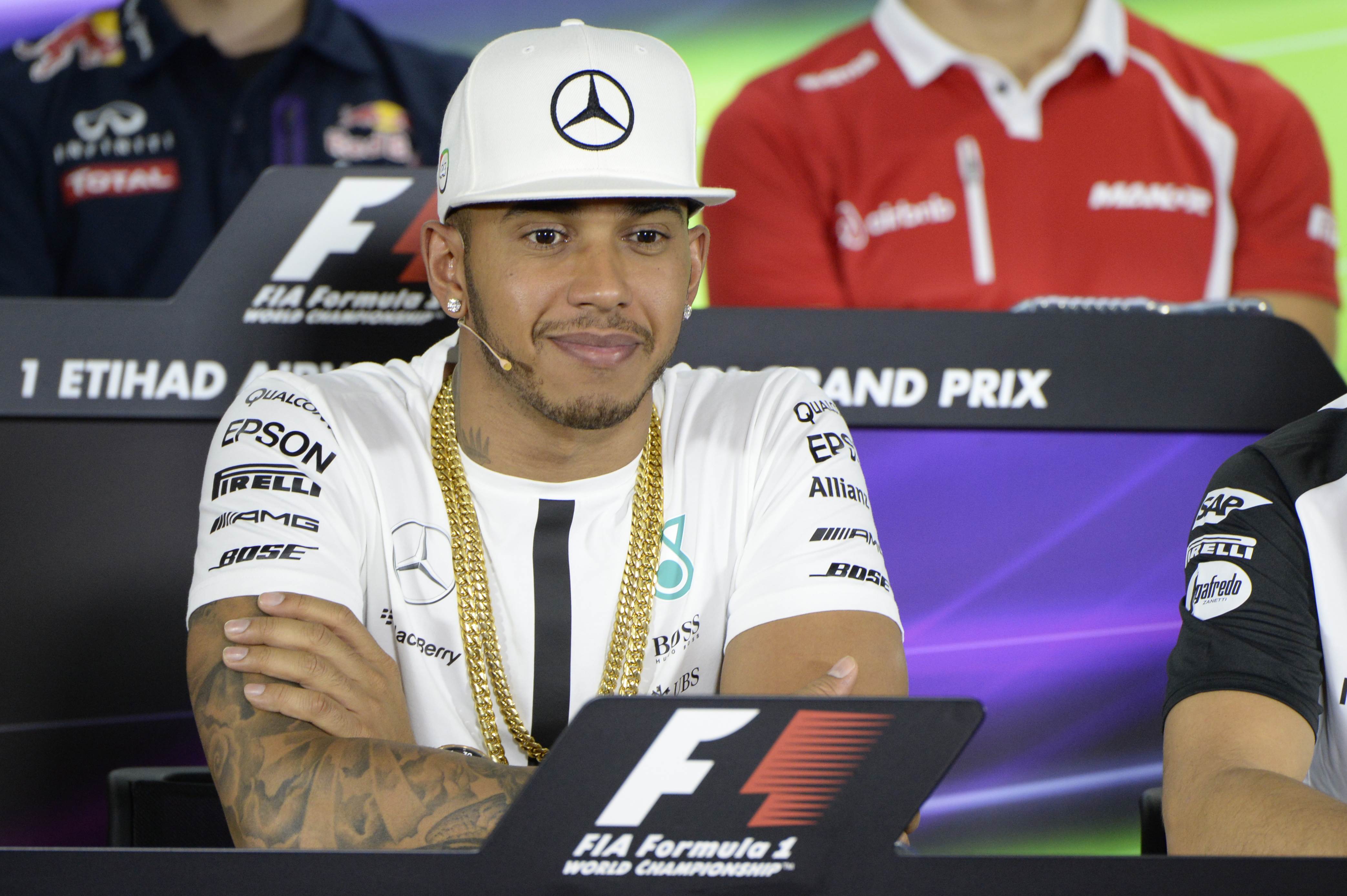 Mercedes AMG Petronas F1 Team's British driver Lewis Hamilton sits during the press conference at the Yas Marina circuit in Abu Dhabi on November 26, 2015 ahead of the Abu Dhabi Formula One Grand Prix. AFP PHOTO / TOM GANDOLFINI