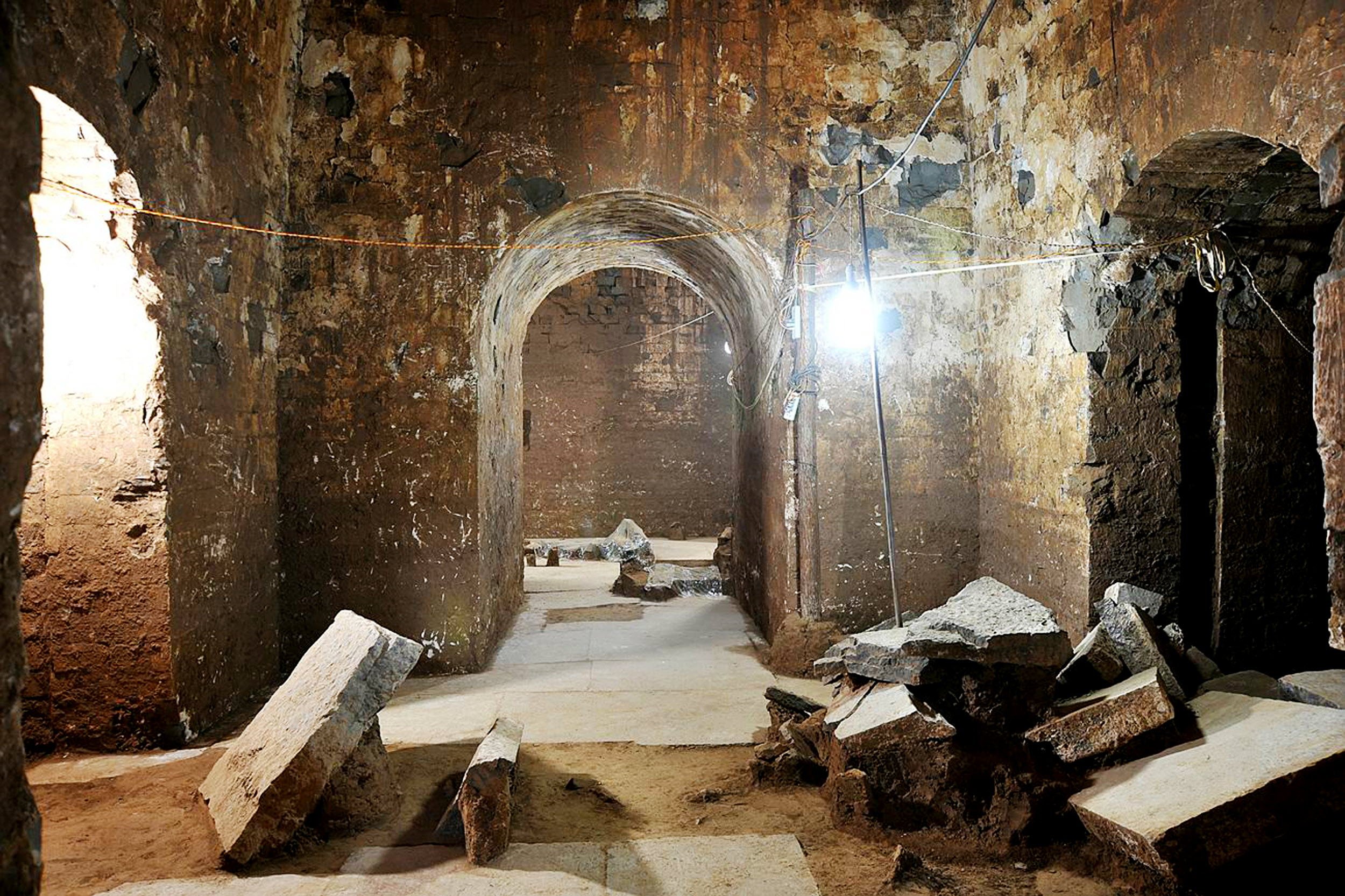 This photo released by archaeologists from China's Henan cultural relic bureau on December 27, 2009 shows the interior of a nearly 1,800-year-old tomb which was found by Chinese archaeologists and believed belonging to the legendary ruler Cao Cao, located in central Henan province, not far from the Yellow River and near the city of Anyang where Cao Cao ruled the Kingdom of Wei from 208 to 220. The tomb was discovered about a year ago, but only became known to authorities after stone tablets carrying inscriptions of "King Wu of Wei" were seized from alleged tomb raiders, a report said. CHINA OUT AFP PHOTO