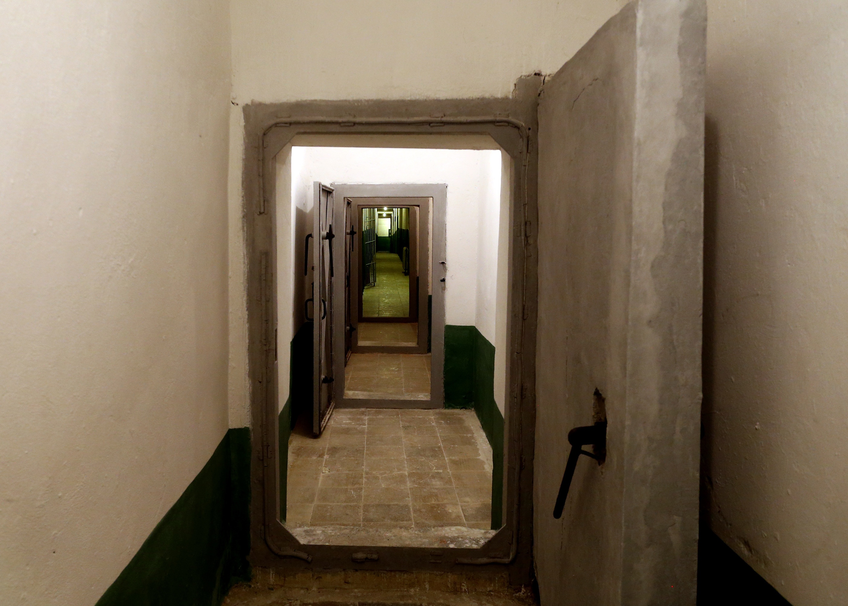 A long corridor is seen at a bunker, built by late communist dictator Enver Hoxha in Tirana, on Saturday, Nov. 22, 2014. A gigantic, secret underground bunker that Albania’s communist regime built in the 1970s to survive a nuclear attack by the Soviet Union or the United States has been opened to the public for the first time. (AP Photo/Hektor Pustina)
