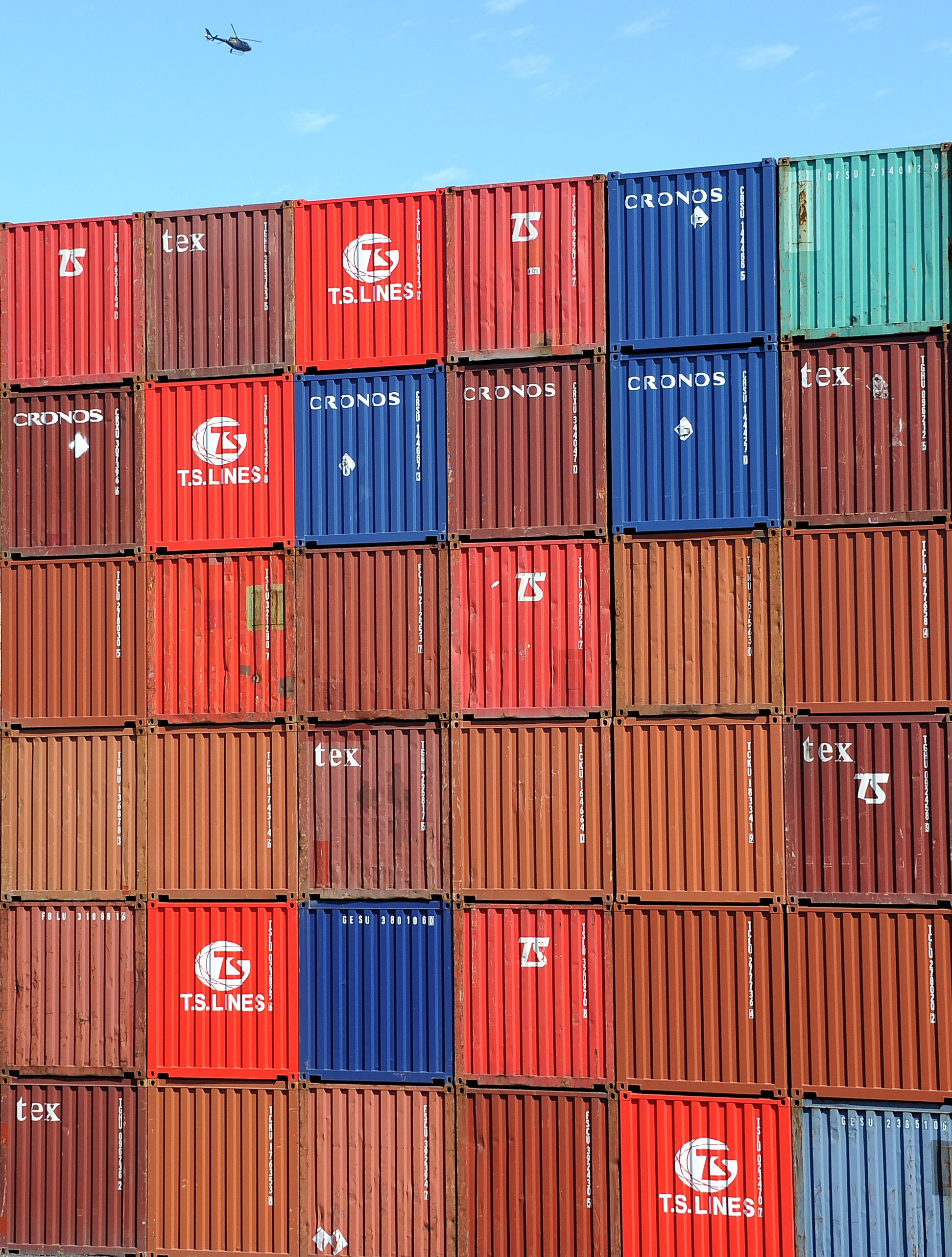 Shipping containers from around the world are stacked at Port Botany in Sydney on December 3, 2010. A report released on April 6, 2011 said the World Trade Organisation (WTO) is calling on the Australian government to deliver large scale changes to the structure of the economy or face far-reaching consequences. AFP PHOTO / Torsten BLACKWOOD
