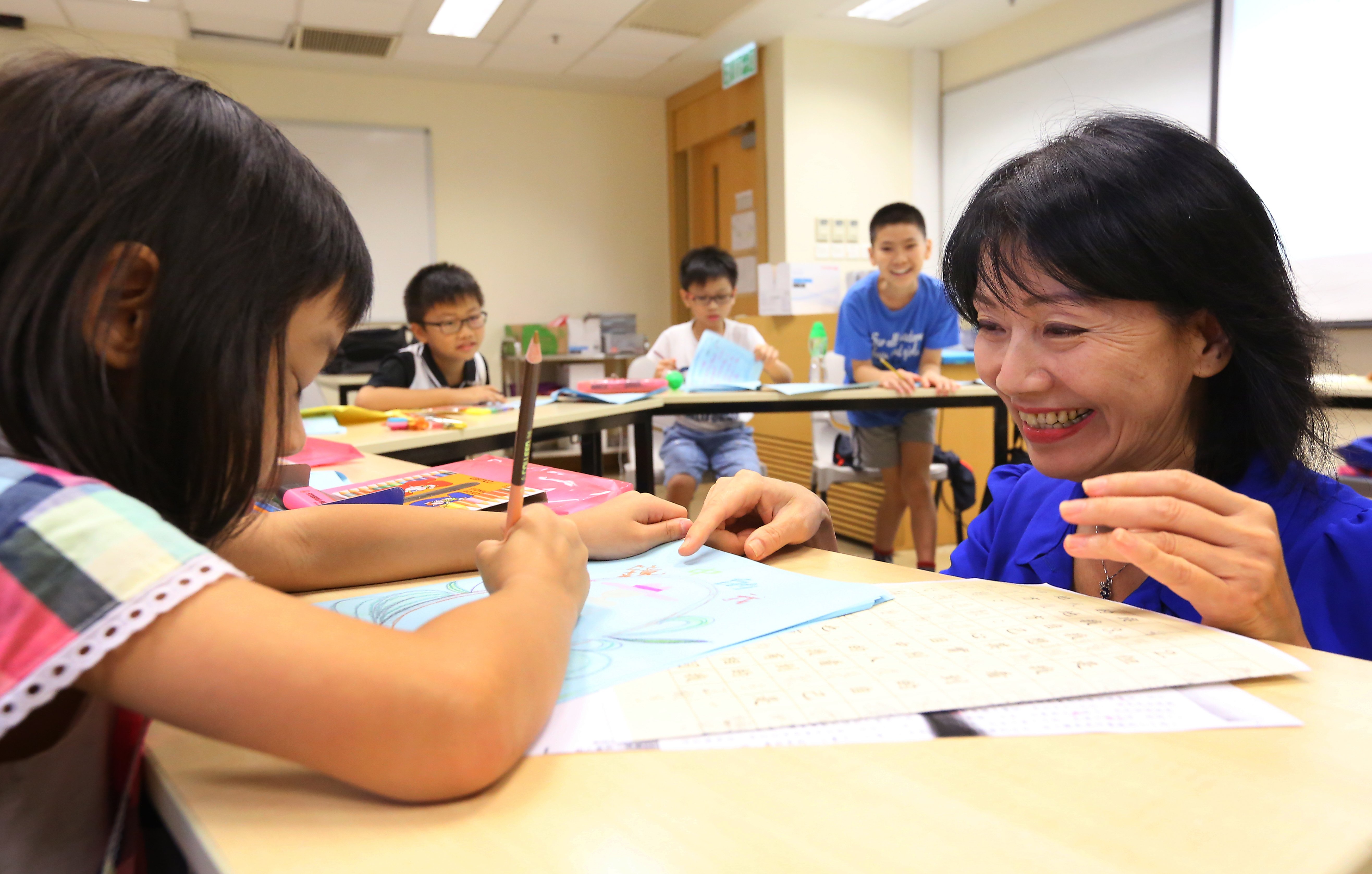 Dr Alice Lai Cheng Cheng-gea, Director of the Manulife Centre for Children with Specific Learning receiving training of students at Polytechnic University in Hung Hom. 11OCT14