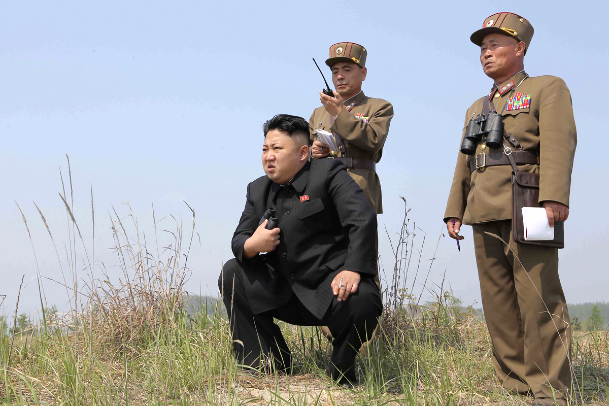 North Korean leader Kim Jong Un (C) guides the multiple-rocket launching drill of women's sub-units under KPA Unit 851, in this undated file photo released by North Korea's Korean Central News Agency (KCNA) April 24, 2014. North Korea said it had successfully conducted a test of a miniaturised hydrogen nuclear device on the morning of January 6, 2016, marking a significant advance in the isolated state's strike capabilities and raising alarm bells in Japan and South Korea. REUTERS/KCNA/Files THIS PICTURE WAS PROVIDED BY A THIRD PARTY. REUTERS IS UNABLE TO INDEPENDENTLY VERIFY THE AUTHENTICITY, CONTENT, LOCATION OR DATE OF THIS IMAGE. FOR EDITORIAL USE ONLY. NOT FOR SALE FOR MARKETING OR ADVERTISING CAMPAIGNS. NO THIRD PARTY SALES. NOT FOR USE BY REUTERS THIRD PARTY DISTRIBUTORS. SOUTH KOREA OUT. NO COMMERCIAL OR EDITORIAL SALES IN SOUTH KOREA. THIS PICTURE IS DISTRIBUTED EXACTLY AS RECEIVED BY REUTERS, AS A SERVICE TO CLIENTS. FROM THE FILES PACKAGE â€˜NORTH KOREA NUCLEAR TEST'SEARCH â