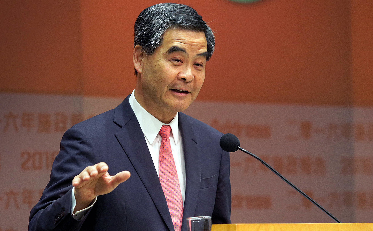 Hong Kong's Chief Executive Leung Chun-ying speaks to the media at a press conference after delivering his 2016 Policy Address to the Legislative Council in the Admiralty district of Hong Kong on January 13, 2016. During his earlier policy address, Leung warned of "obstacles" ahead for the city's economy amid a global economic slowdown, triggered by tumult in China, that hit Hong Kong's trade sector last year. AFP PHOTO / ISAAC LAWRENCE