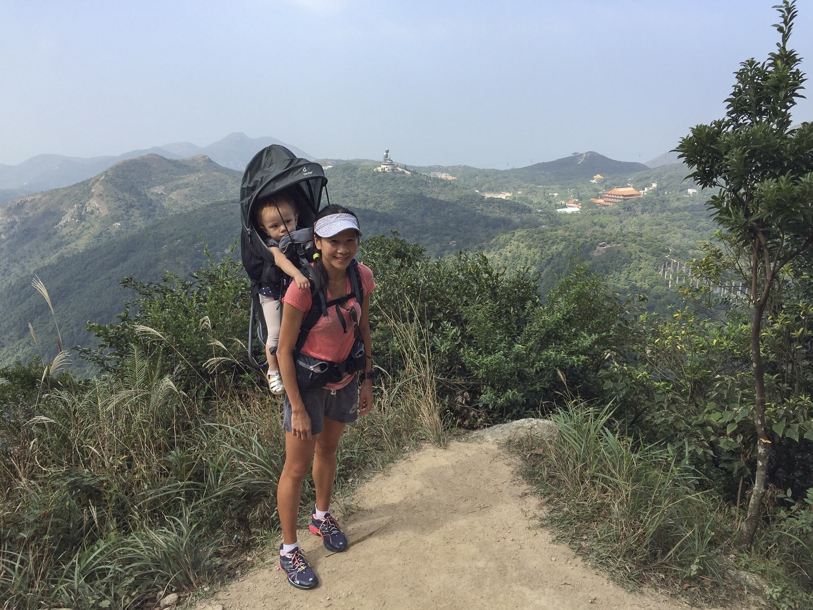 This handout image shows writer Jeanette Wang, daughter Marla and her Deuter Kid Comfort III child carrying rucksack on Lantau Island. 26AUG15 [fitness]