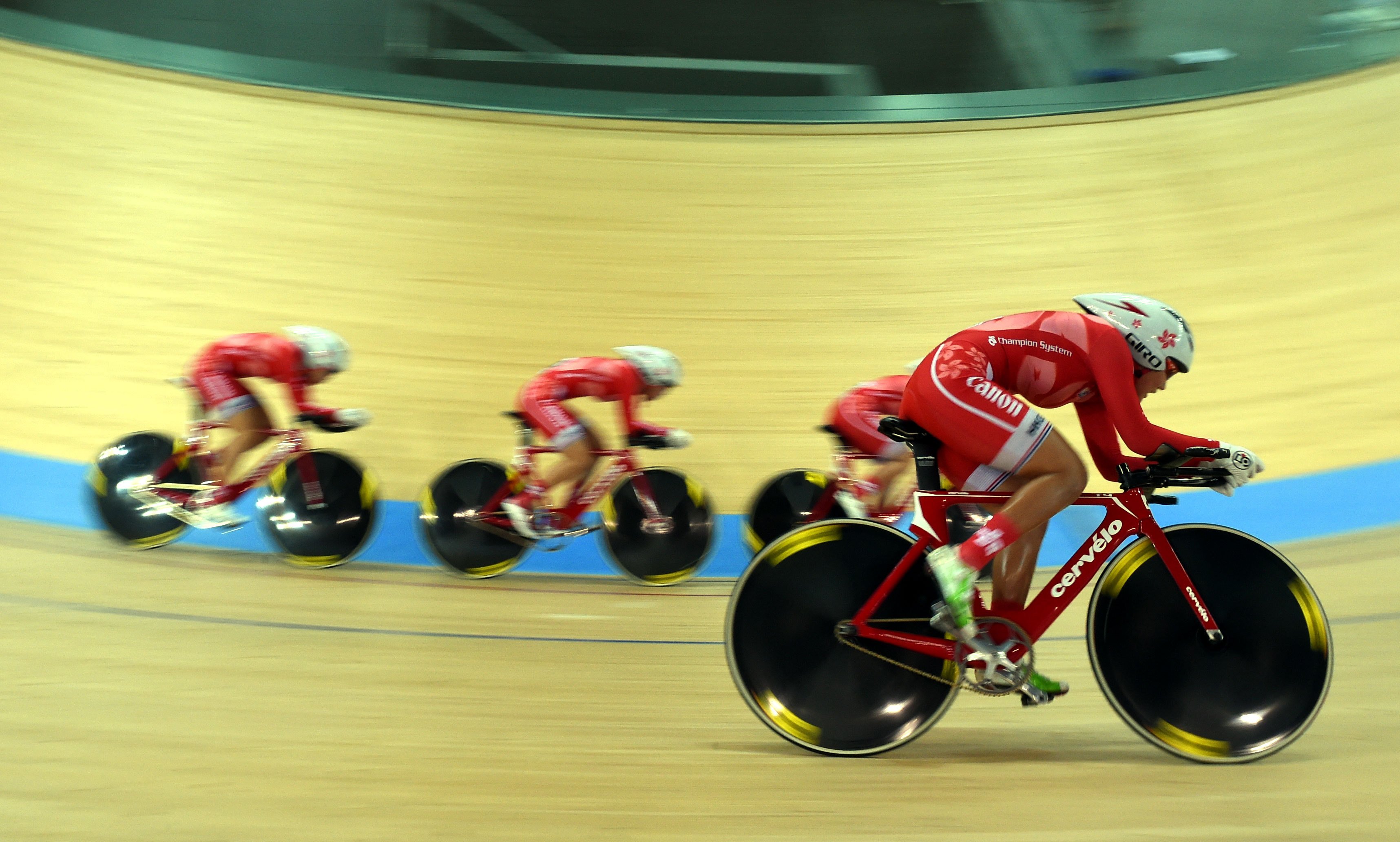 The Hong Kong women's pursuit team on their way to 11th in qualifying in Tseung Kwan O. Photos: Xinhua 