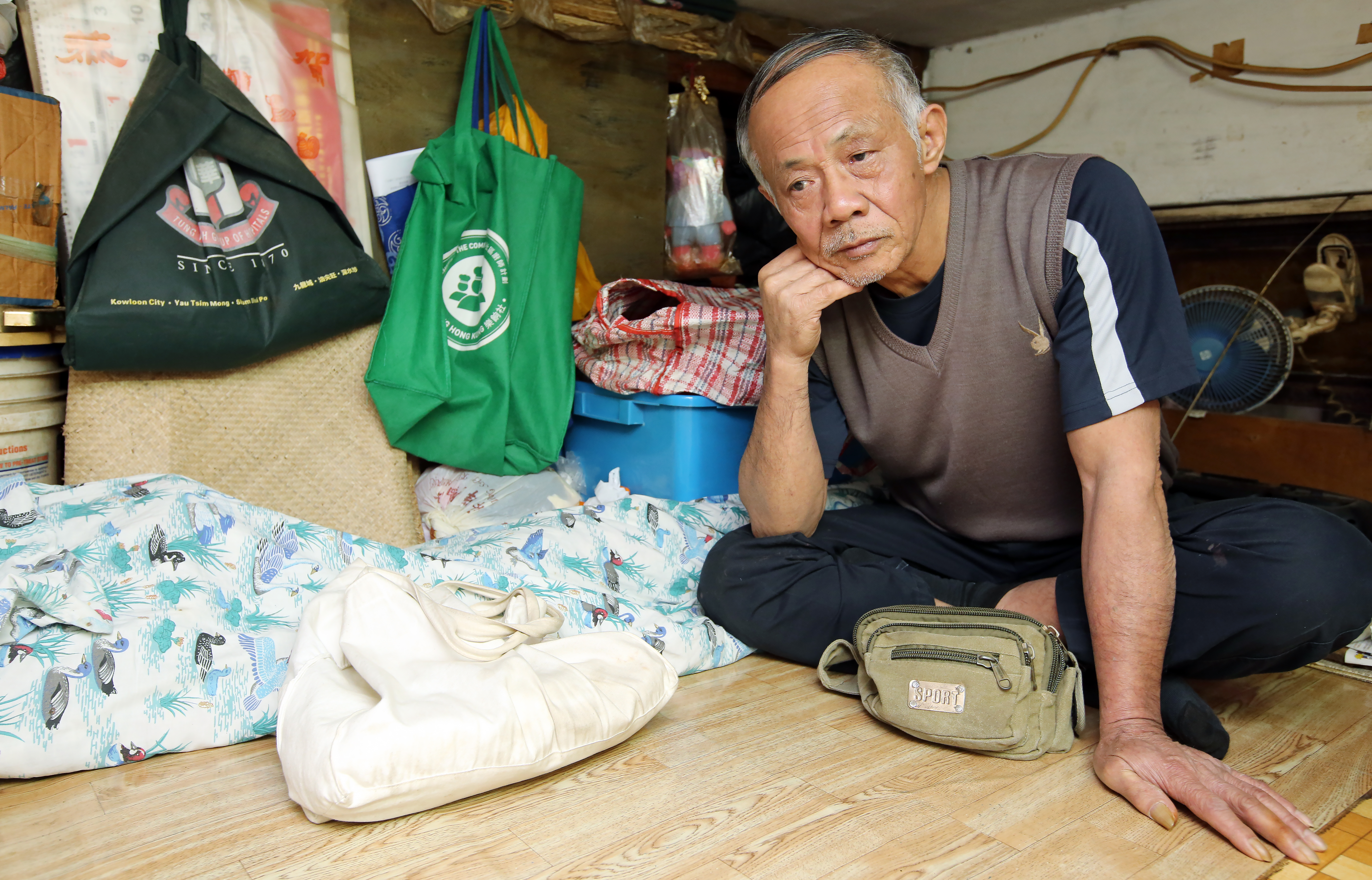 Interview 66-year-old Mr Lam, still working as a cleaner, for a story on Policy Address Sham Shui Po. 12JAN16 SCMP/ Edward Wong