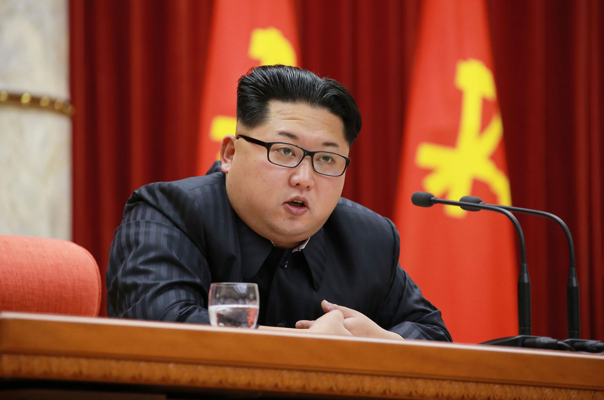 This picture released from North Korea's official Korean Central News Agency (KCNA) on January 13, 2016 shows North Korean leader Kim Jong-Un delivering a speech at a national awards ceremony for nuclear scientists who contributed to the country's latest nuclear test in Pyongyang on January 12, 2016. North Korea says last week's test was of a miniaturised hydrogen bomb -- a claim dismissed by experts who argue the yield was far too low for a full-fledged thermonuclear device. REPUBLIC OF KOREA OUT AFP PHOTO / KCNA via KNS THIS PICTURE WAS MADE AVAILABLE BY A THIRD PARTY. AFP CAN NOT INDEPENDENTLY VERIFY THE AUTHENTICITY, LOCATION, DATE AND CONTENT OF THIS IMAGE. THIS PHOTO IS DISTRIBUTED EXACTLY AS RECEIVED BY AFP. ---EDITORS NOTE--- RESTRICTED TO EDITORIAL USE - MANDATORY CREDIT "AFP PHOTO/KCNA VIA KNS" - NO MARKETING NO ADVERTISING CAMPAIGNS - DISTRIBUTED AS A SERVICE TO CLIENTS