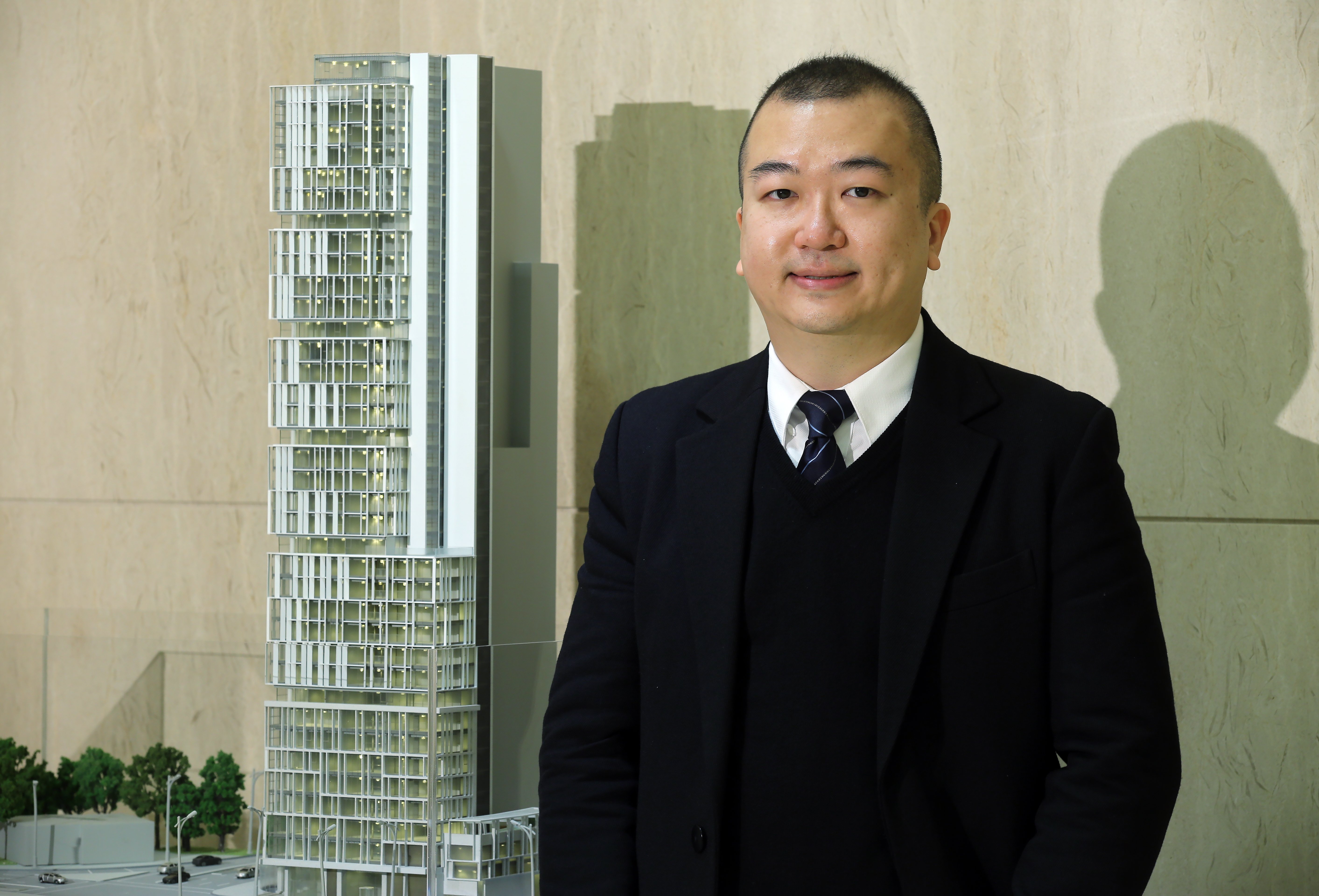 Jacky Chan Ka-yeung, Group Vice President of China Aoyuan Property Group poses picture at their office in Tsim Sha Tsui. 15JAN16 SCMP/Edward Wong