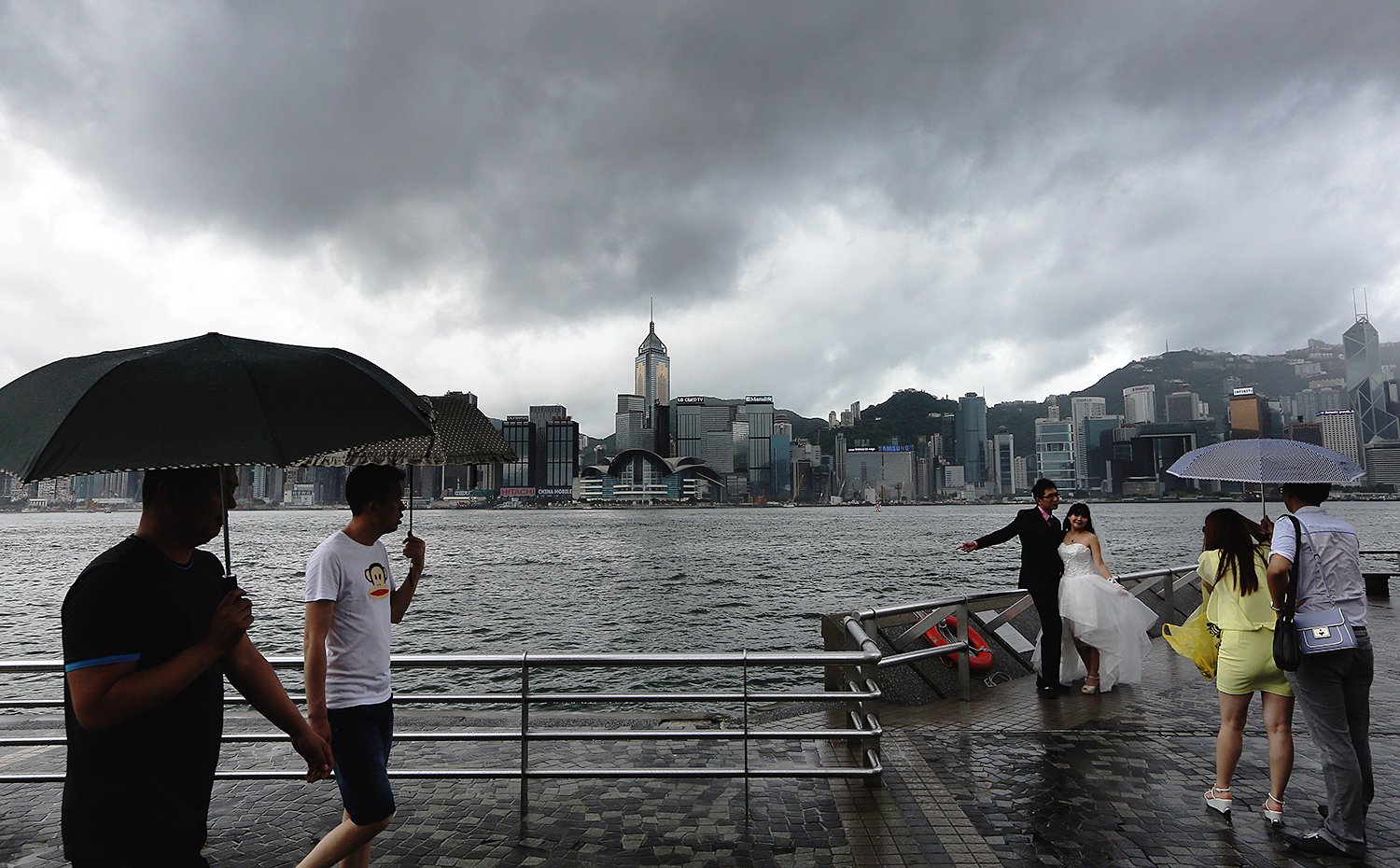 Stromy weather is seen at the Tsim Sha Tsui as the tropical storm Kujira approaching Hong Kong, standby signal No.1 is in force. 22JUN15