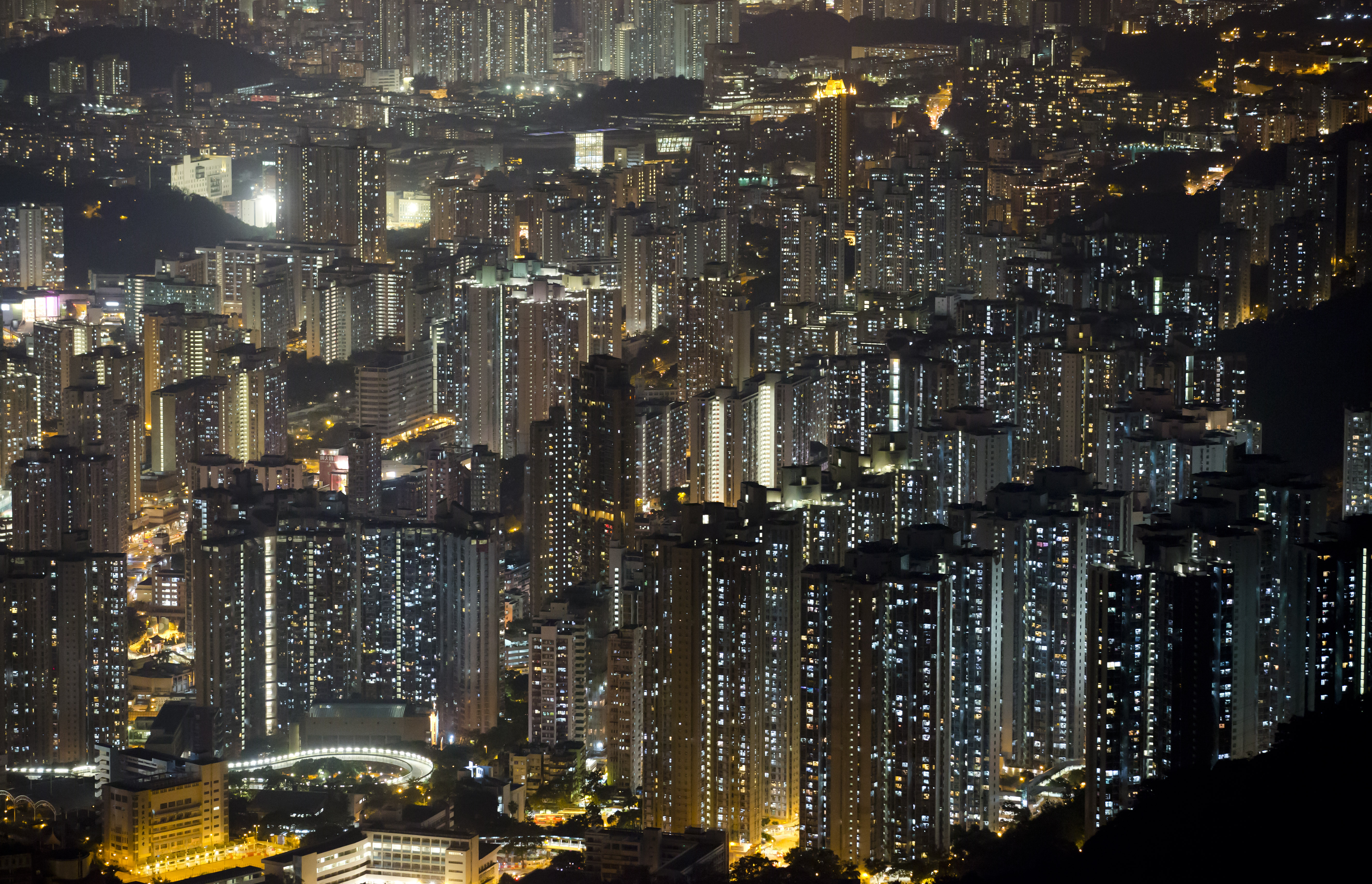 This Nov. 27, 2015 photo shows apartment buildings in Hong Kong. In tightly-packed Hong Kong, the dead are causing a problem for the living. Limited land to build on and soaring property prices mean Hong Kong is fast running out of space to store the dead. (AP Photo/Kin Cheung)