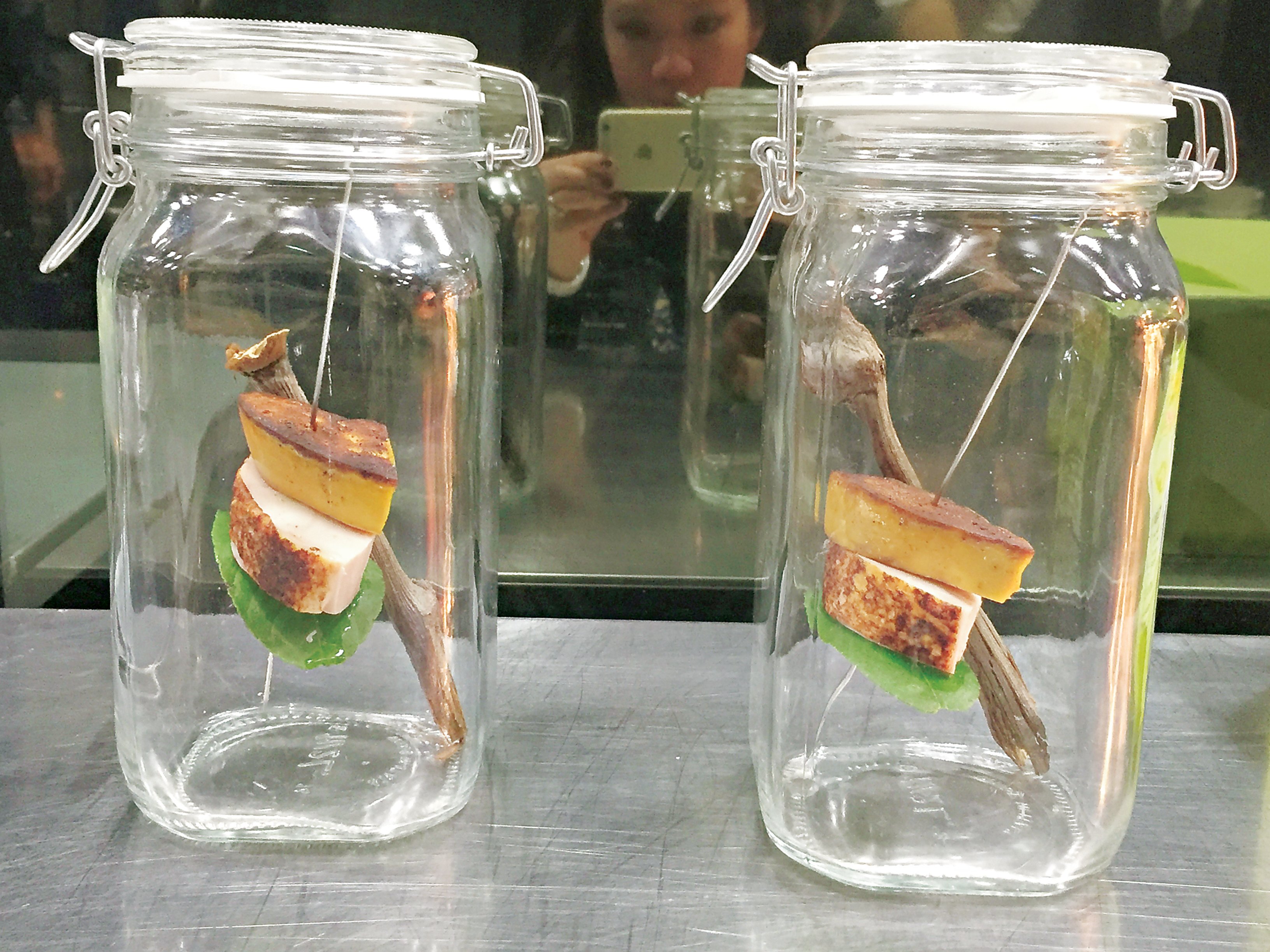 ***ONE TIME USE ONLY, PLEASE CLEAR THE COPYRIGHTS BEFORE RE-USE - OTUO*** This handout image shows chicken in a Jar served underneath a slice of foie gras, which has been smoked by Ultraviolet chef Paul Pairet in Shanghai. Photo / Juliana Loh [05FEBRUARY2016 FEATURES FOOD & WINE]