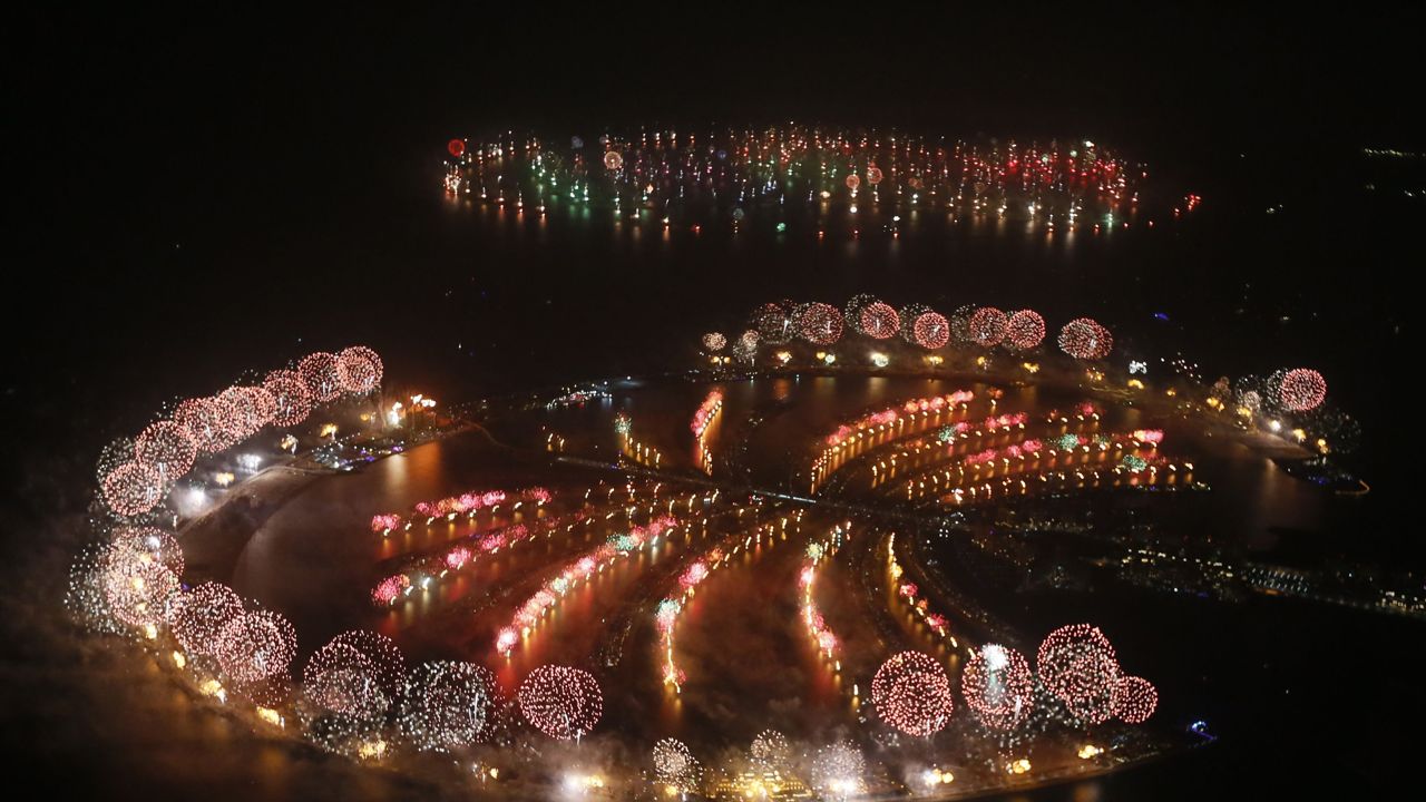 Fireworks explode over Palm Jumeirah in Dubai to celebrate the new year. The company that built Palm Jumeirah will double the size of its Dragon Mart complex. Photo: AFP