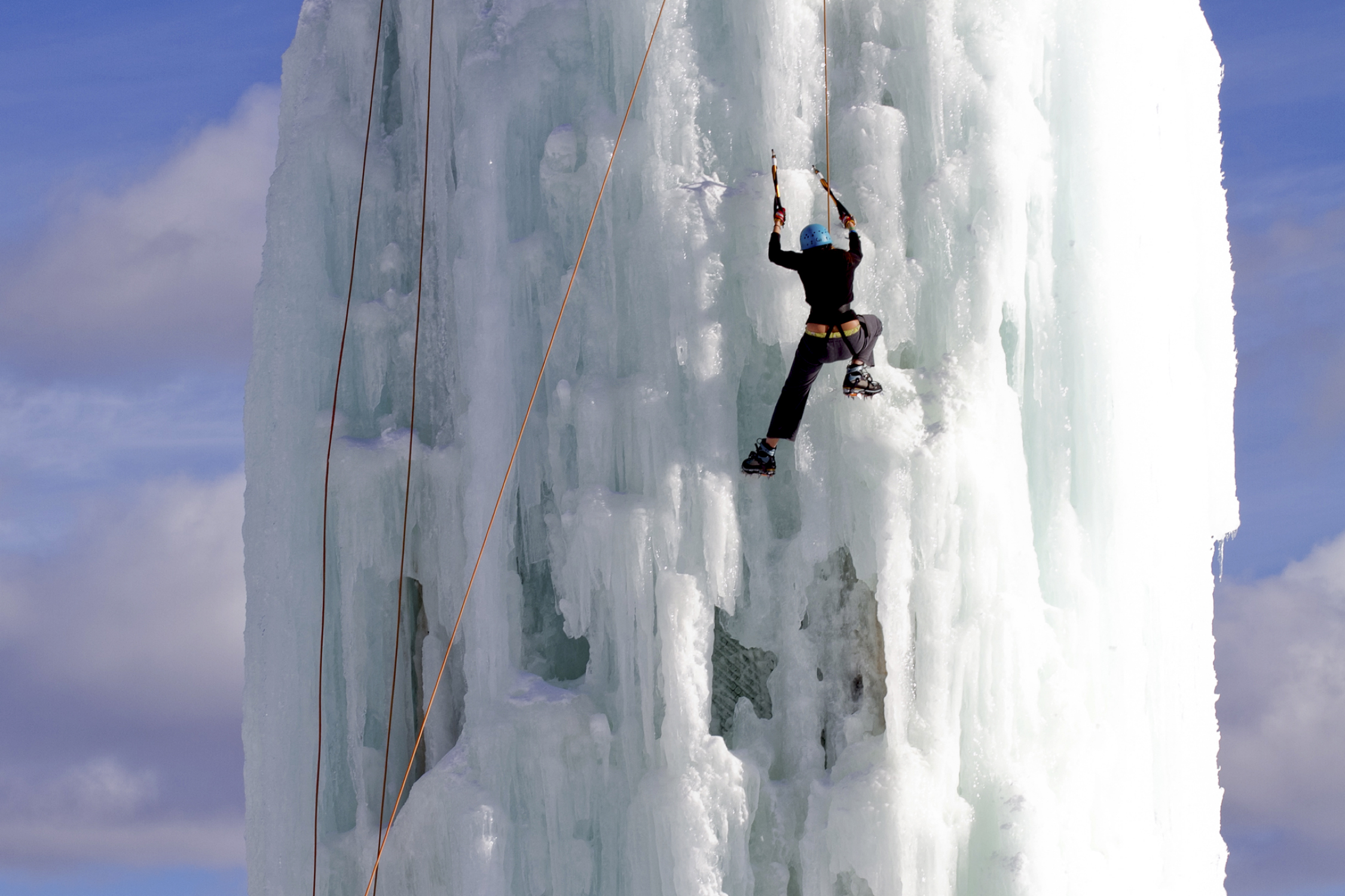 --ONE TIME USE ONLY-- This handout image shows participants ice climbing in British Columbia which has an impressive 60-foot high ice tower located in Happy Valley Adventure Park. 05FEB11 [TRAVEL AND LEISURE INTER SPORTS ONLINE]