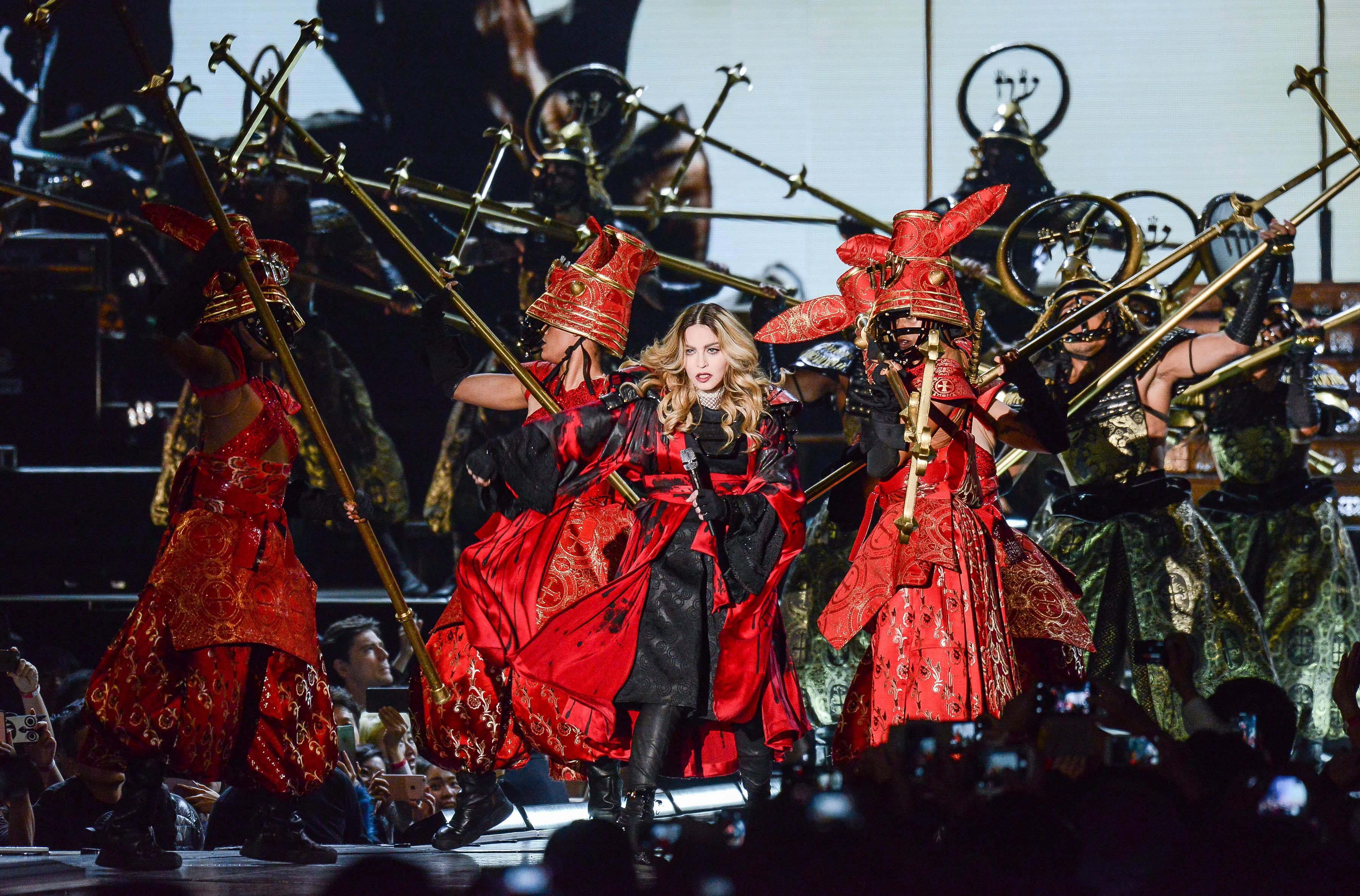 epa05146404 A handout photo released by Live Nation Taiwan entertainment company shows US singer Madonna peforming at a concert in the Taipei Arena in Taipei, Taiwan, 06 Feburary 2016. Taipei is the first stop of the Australia-Southeast Asia leg of Madonna's 'Rebel Heart' tour. The tour began in Canada in September 2015, moved to the US, Latin Amercia and Europe, and will end in Sydney, Australia, on 20 March 2016. After Taipei, Madonna will fly to Thailand to peform on 09 and 10 February. EPA/LIVE NATION TAIWAN / HANDOUT HANDOUT EDITORIAL USE ONLY/NO SALES